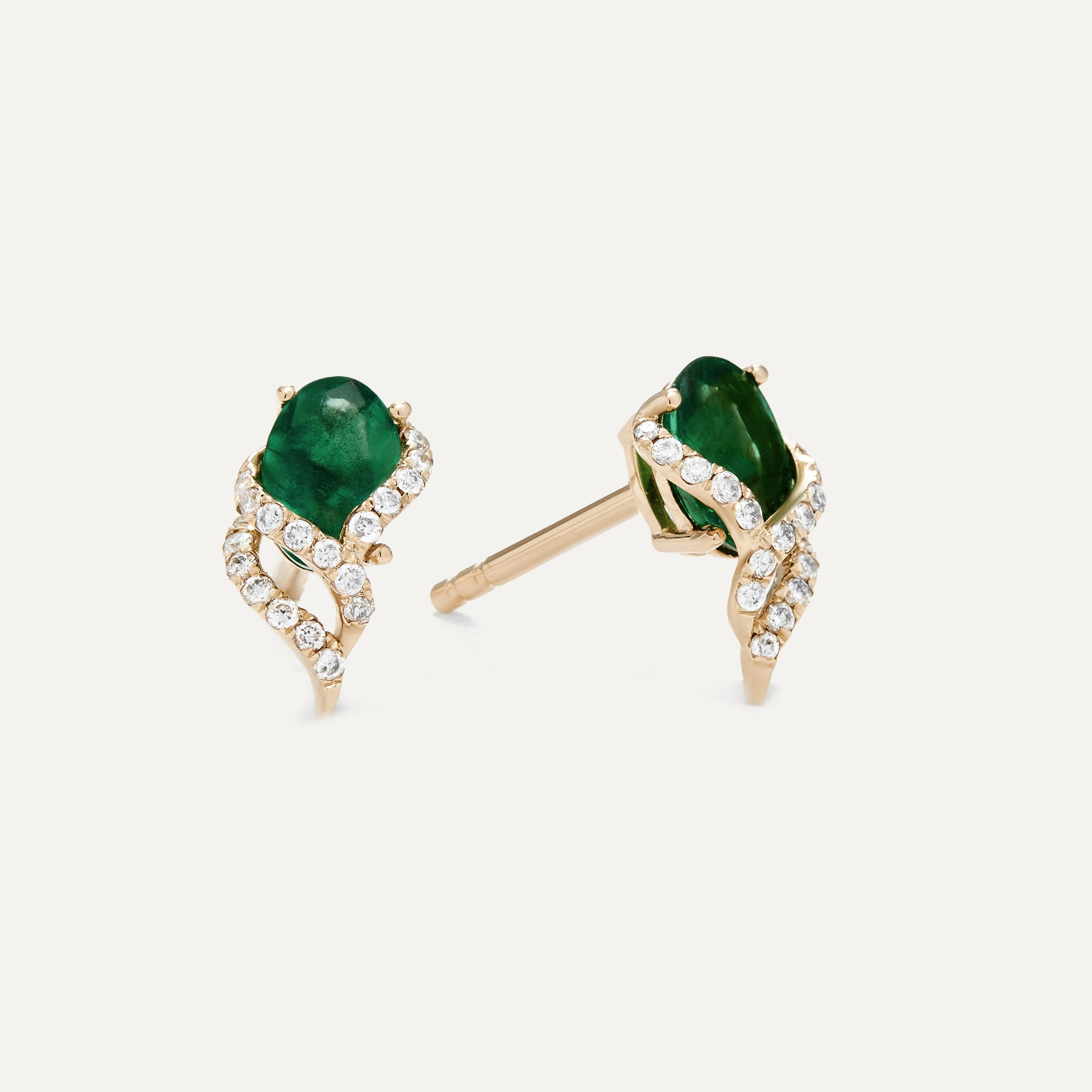 These Diamond Emerald Studs are a fusion of modern aesthetics and timeless elegance. These stud earrings feature a unique combination of white diamonds and vibrant emeralds, showcasing the perfect harmony between these two exquisite gemstones. The