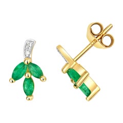 DIAMOND 
EMERALD STUDS IN 9CT Gold