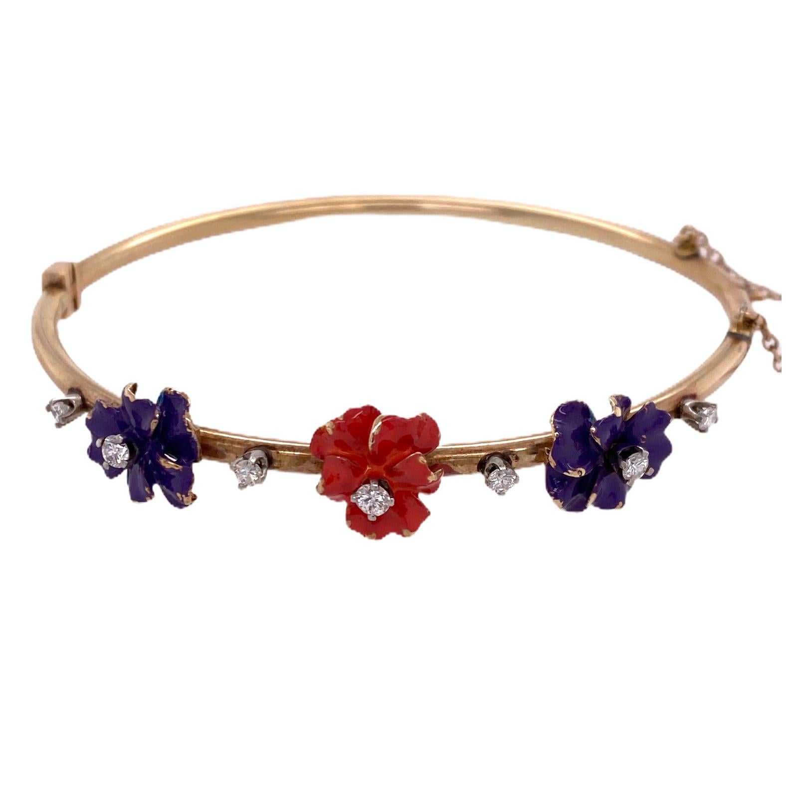 Feminine and beautifully hand crafted enamel floral diamond bangle bracelet fashioned in 14 karat yellow gold. This vintage bangle features pink and purple enamel flowers set and surrounded by 7 round brilliant cut diamonds weighing .30 carat total