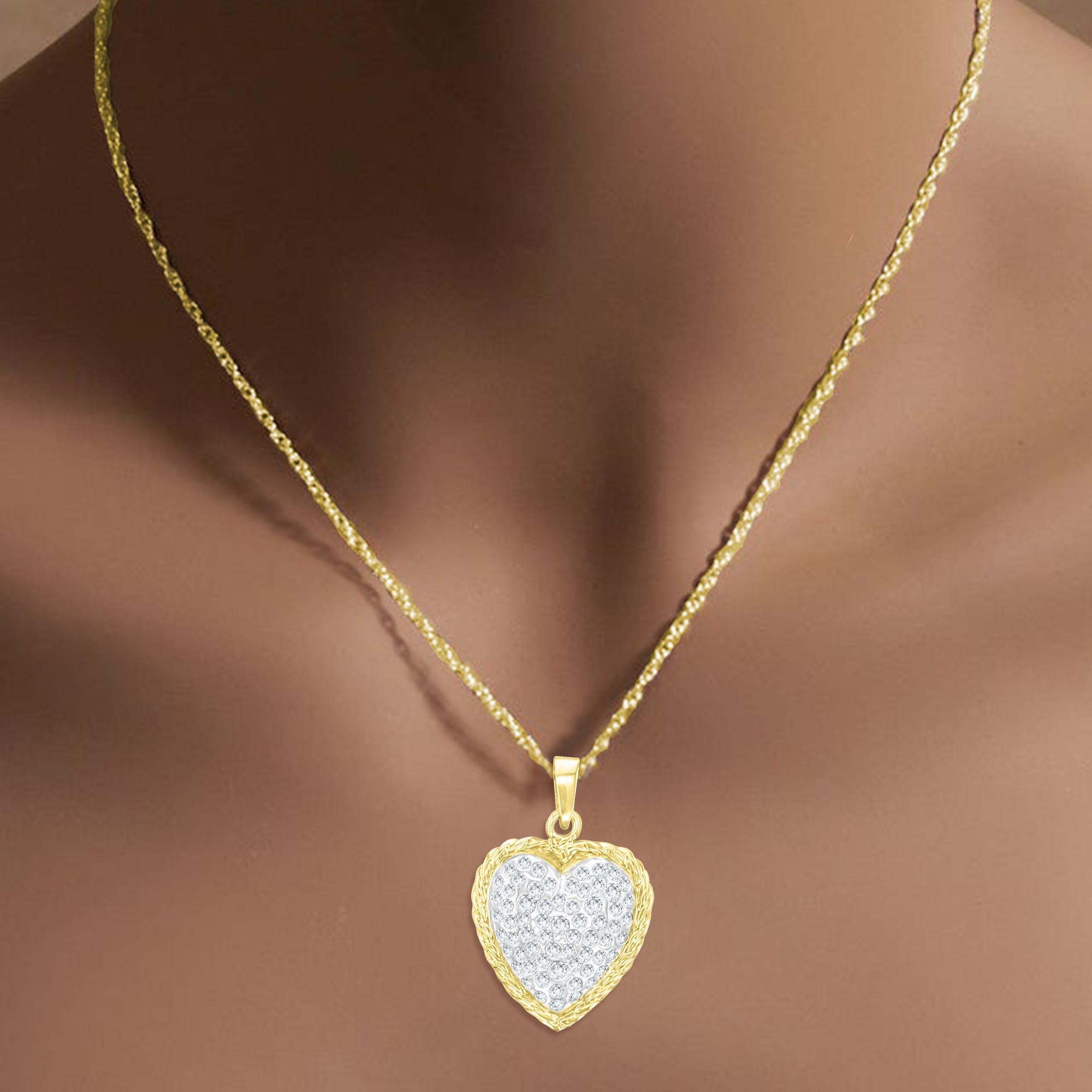 ♥ Product Summary ♥

Main Stone: Diamonds
Approx. Total Carat Weight: 1.50cttw
Diamond Color: G
Diamond Clarity:  SI2
Stone Cut: Round
Metal Choice: 14K Yellow Gold
Dimensions: 24mm x 22mm
Chain: 18