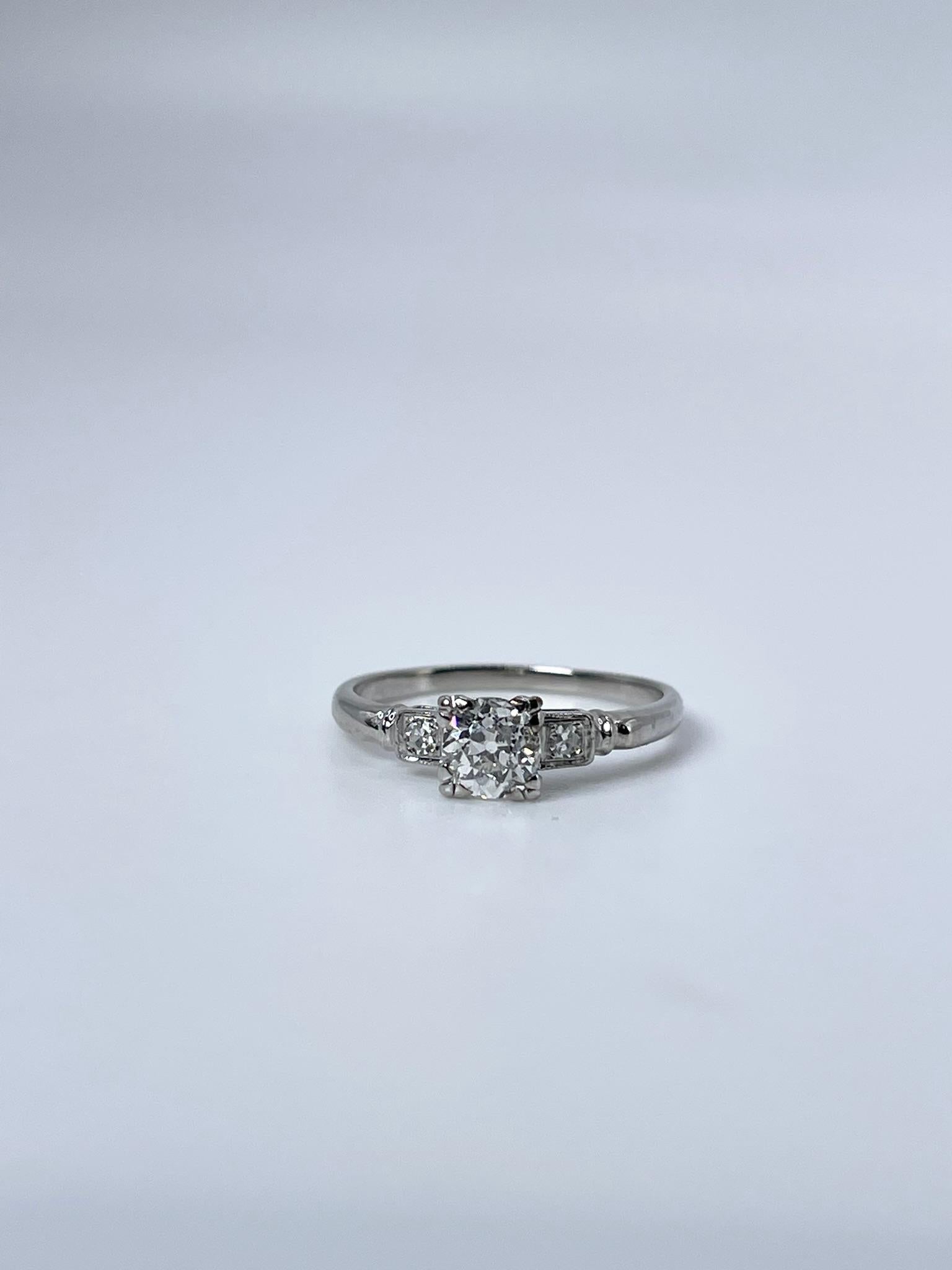 Stunning antique diamond engagement ring made with old minie cut center diamond in 14KT white gold.
ITEM: MMEI 100-00024
GRAM WEIGHT: 2.35gr
METAL: 14KT white gold

NATURAL DIAMOND -center
Cut: Old Mine
Color: F
Clarity: VS2 
Carat: 0.55ct

NATURAL