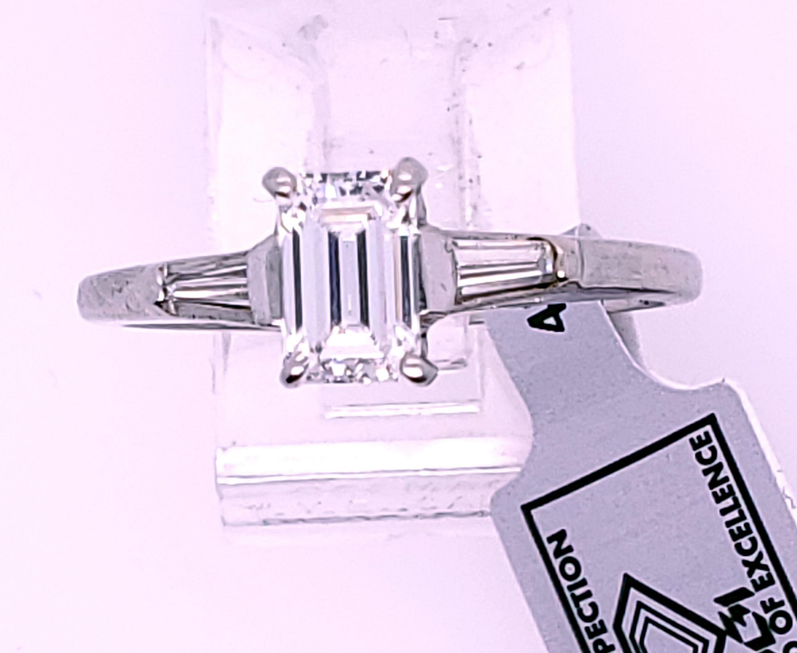 Emerald Cut Diamond Engagement Ring - IGI Certed - In Platinum with Two Baguettes For Sale