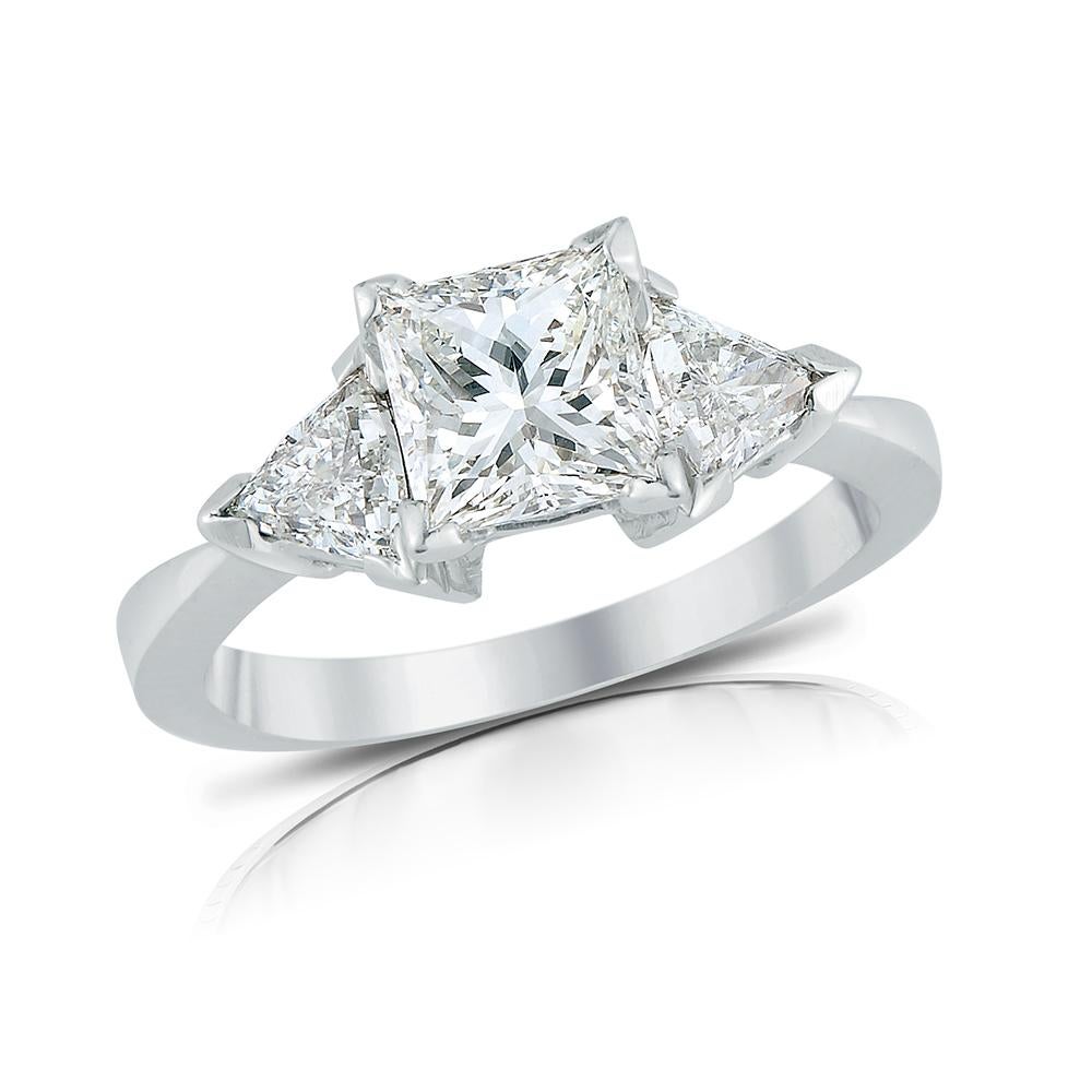 Diamond Engagement ring made of Platinum, set in the center with Princess cut Diamond, weight 1.10 carat, H color VVS1 clarity and Triangles Diamond weight 0.25 carat on each side. Total Diamond weight 1.60 carat.