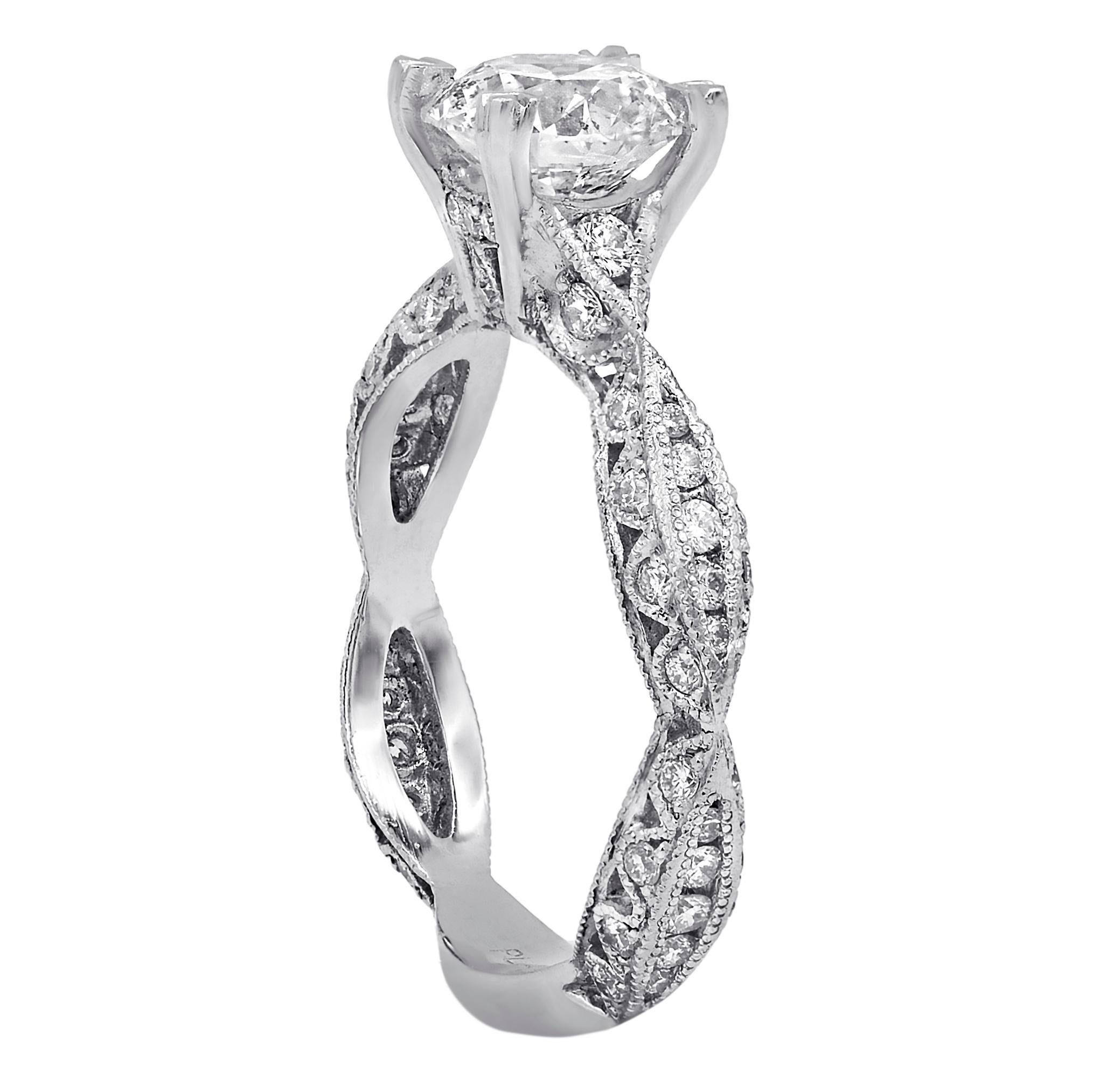Diamond engagement ring with egl certified 1.51 ct f-si1 (rdc3425) set with micropave diamonds (.70ct) all the way around in filigree twisty platinum setting.

