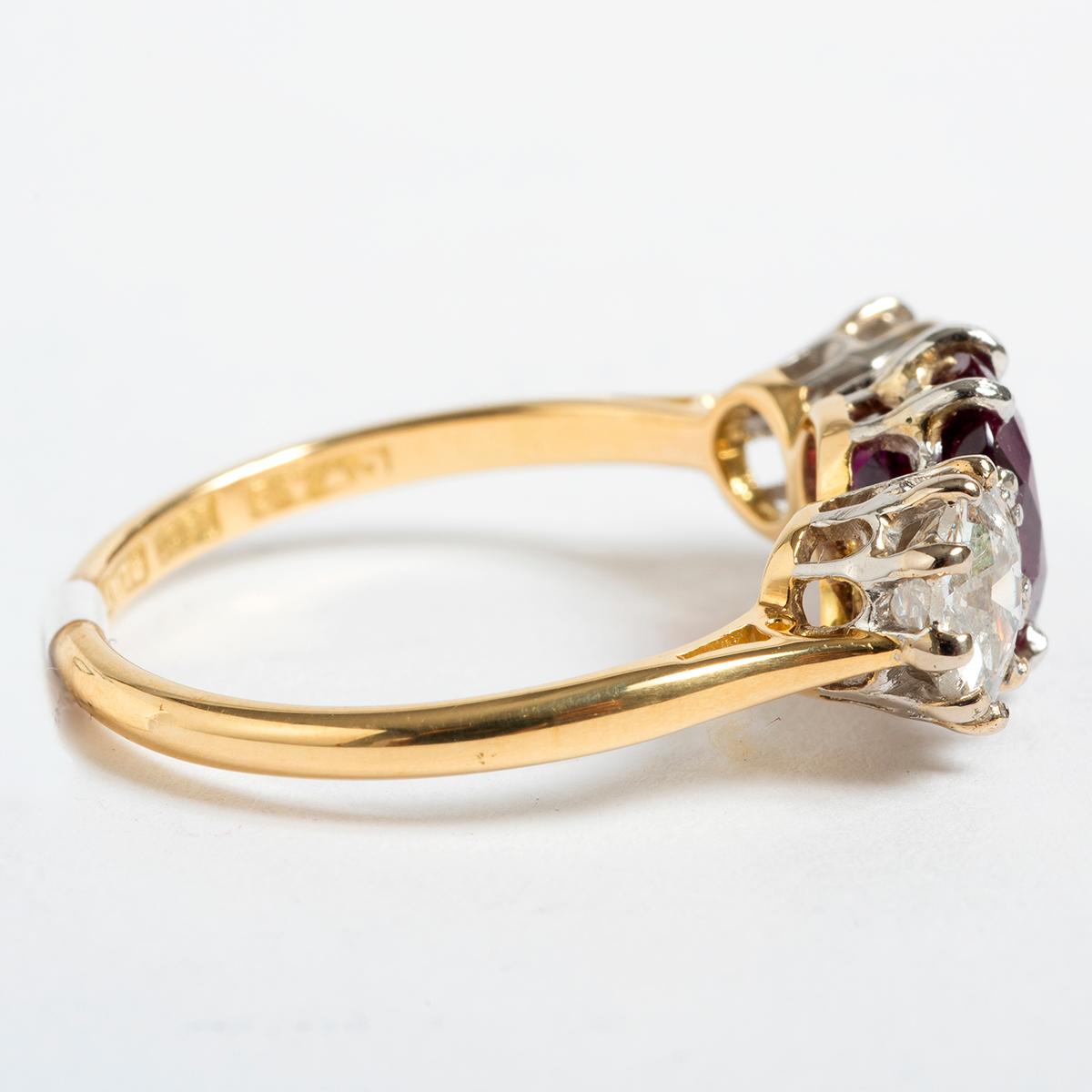 Our diamond and ruby three stone ring is a classic and beautiful piece from the 1950's, set in 18K Yellow gold this ring comes in UK size O 1/2 / US size 7.5. Weight, rubies are est 2.23ct and diamonds est 1ct, with clarity and colour i/si3. An