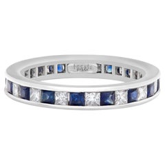Diamond Eternity Band and Ring with Sapphire in Platinum; 1 Carat in F-G Color V