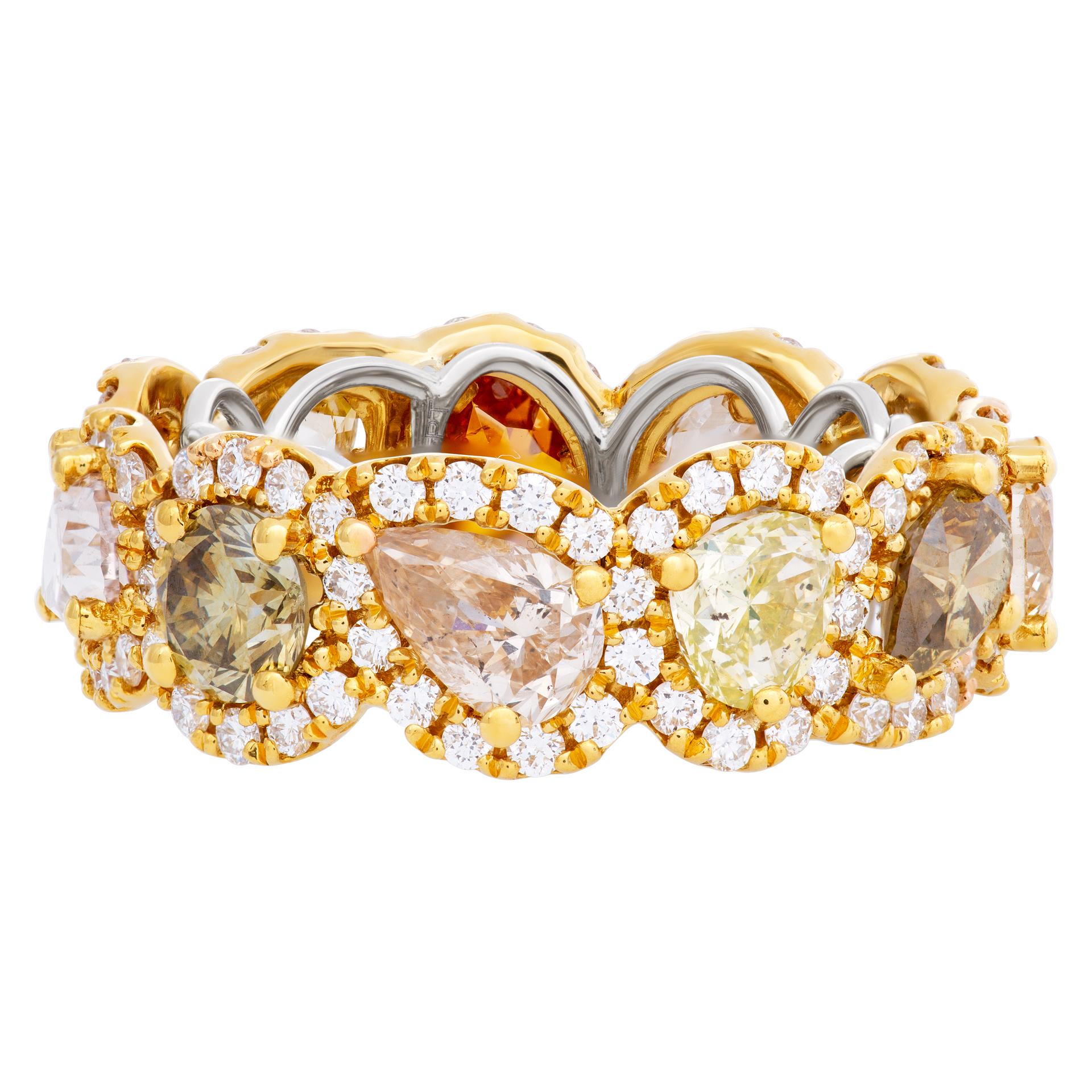 Gorgeous fancy cut diamond eternity band in platinum & 22k gold; 5.66 carats in multi colored yellow diamonds and 1.29 carats in white diamonds. Size 7.25

This Diamond ring is currently size 7.25 and some items can be sized up or down, please ask!