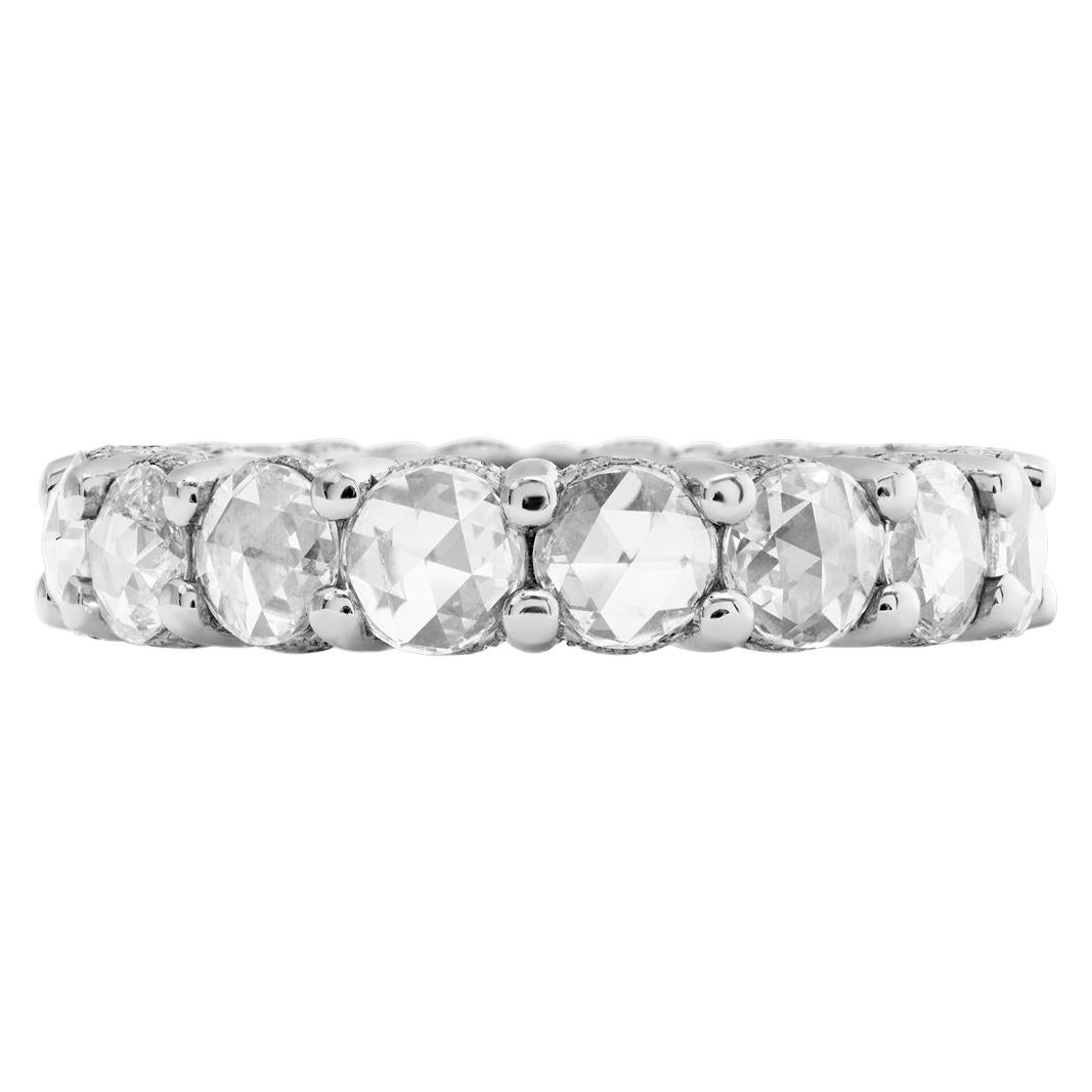 Diamond eternity band set in platinum, with approximately 3 carats in round rose cut diamonds G-H color, VS-SI clarity. Size 6.25 This Eternity Band ring is currently size 6.25 and some items can be sized up or down, please ask! It weighs 4.7