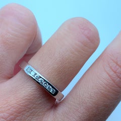 Diamond eternity channel set wedding ring 18k white gold