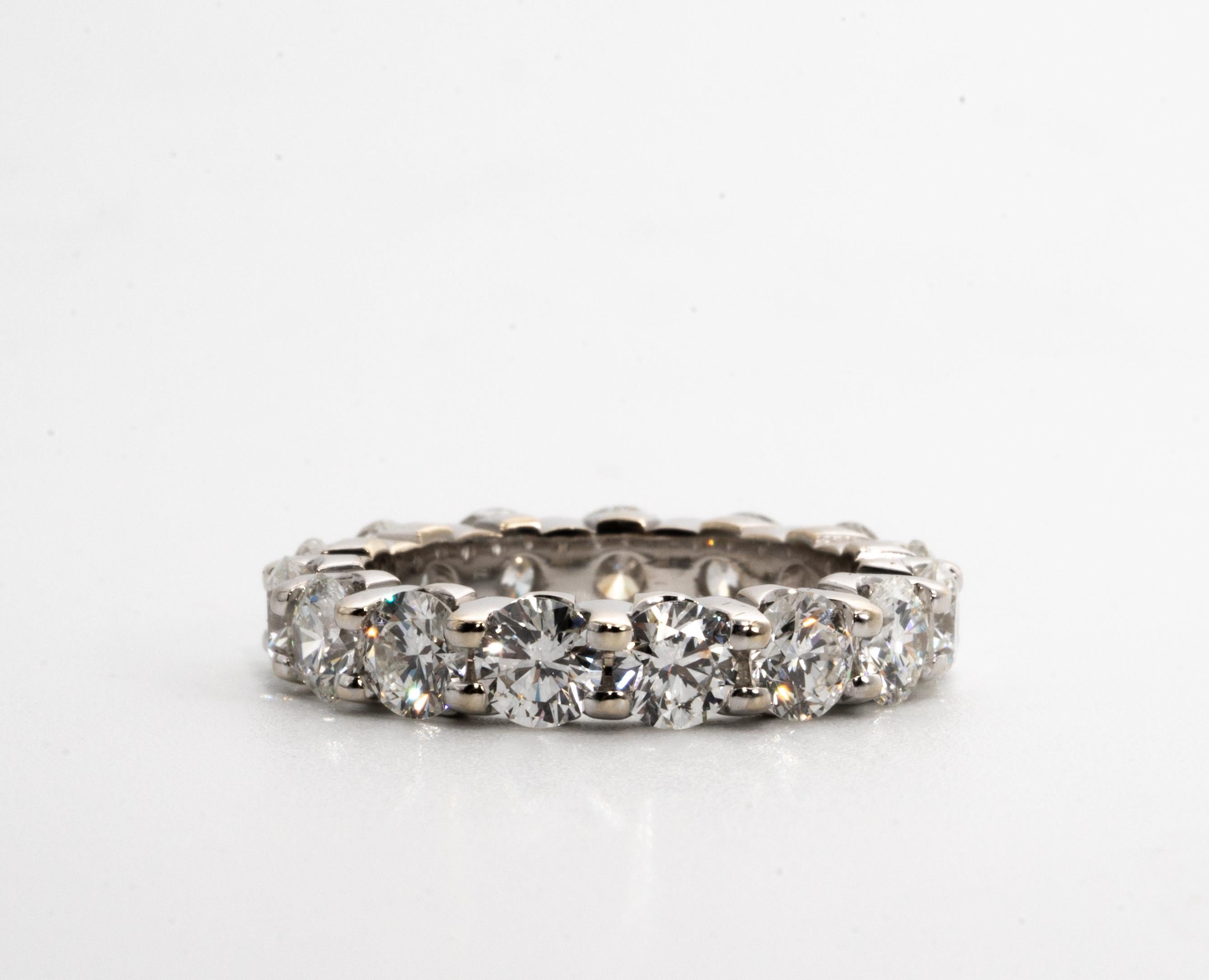 Diamond Eternity Ring in 18K White gold with 15 Round Brilliant diamonds
weighing a total weight of 4.71 Cts , in D-E Color , VS clarity or better.  

Ring Size:  6.5

*This ring can be custom made to any finger size - Please inquire for details