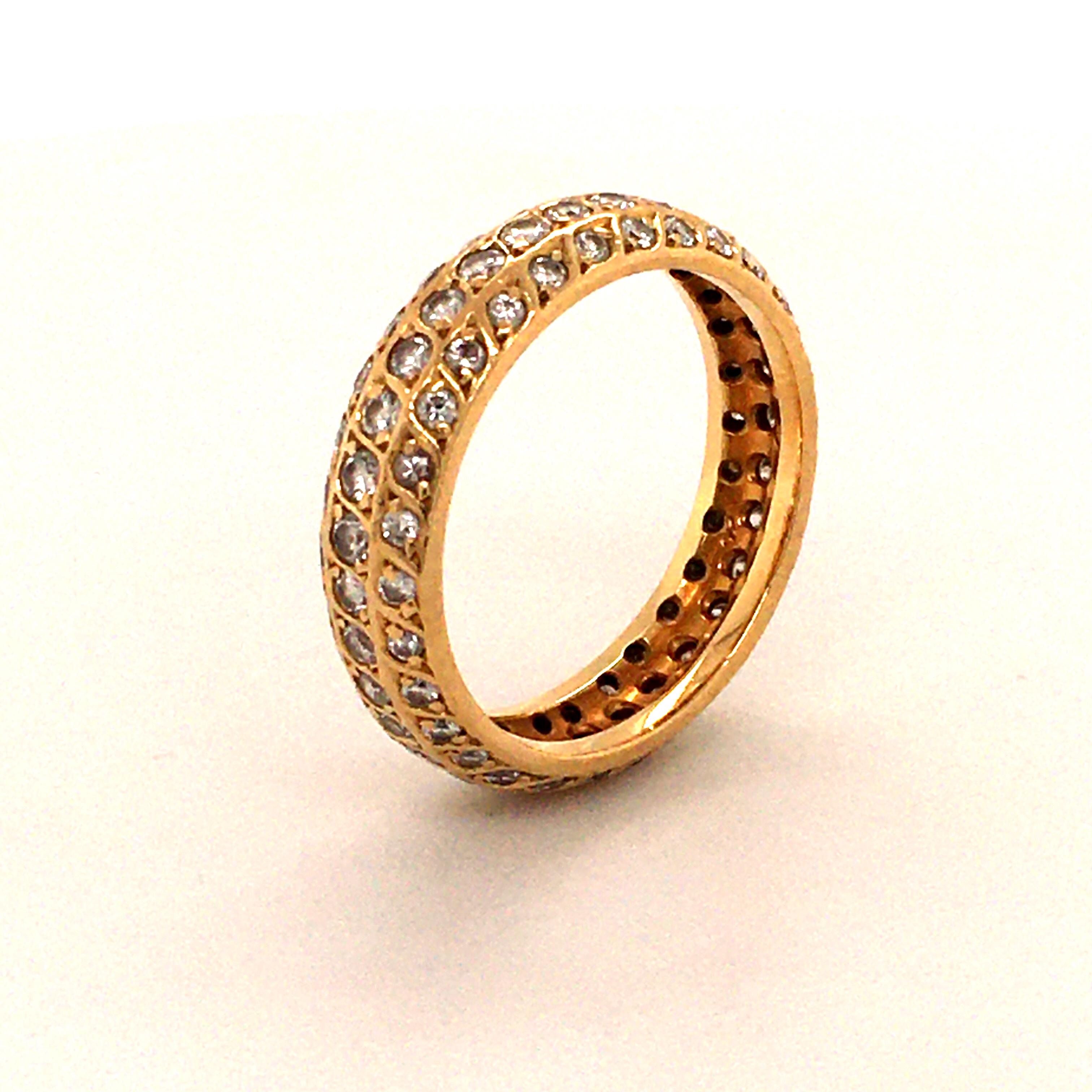 Round Cut Diamond Eternity Ring in 18 Karat Yellow Gold For Sale