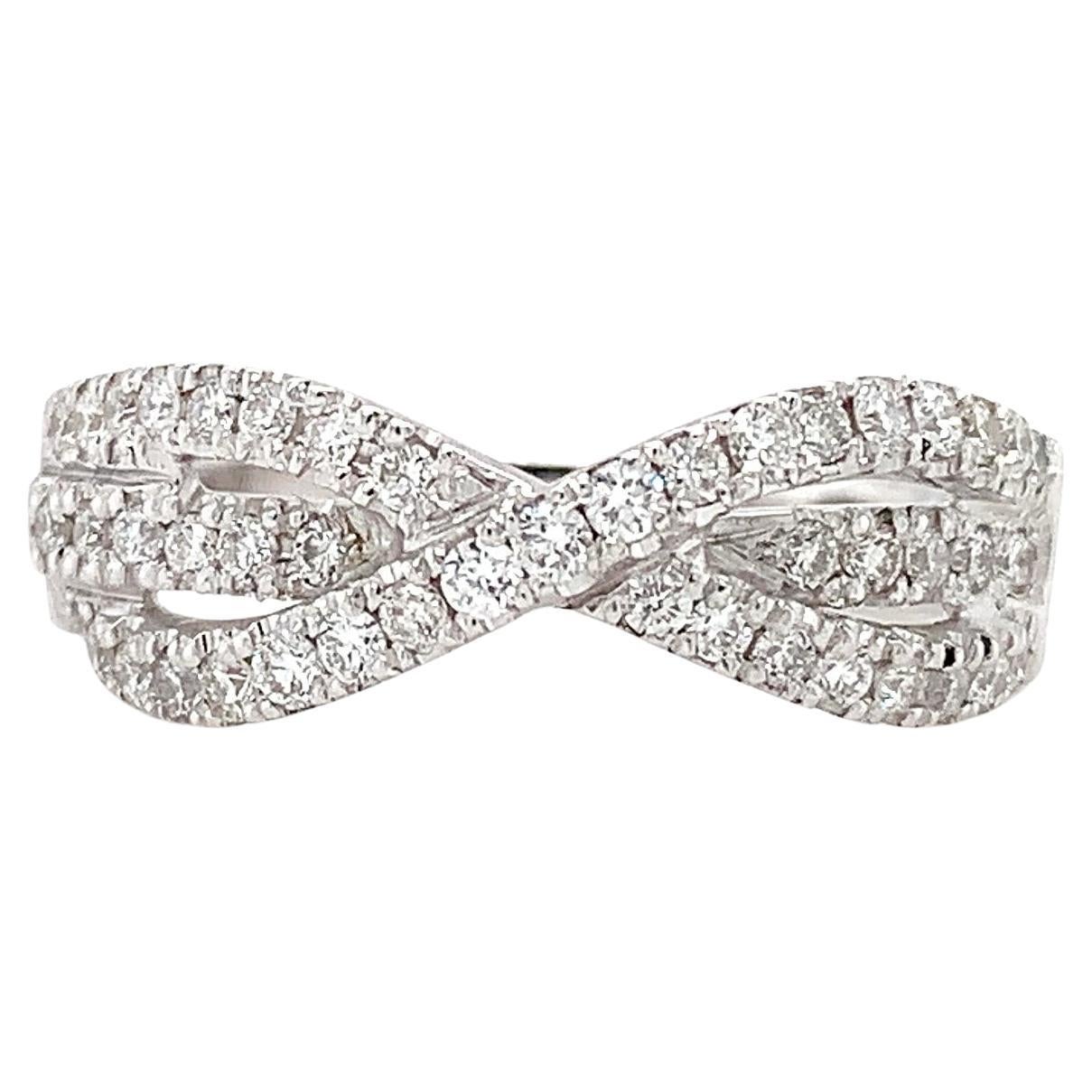 Diamond eternity triple row engagement ring 18k white gold