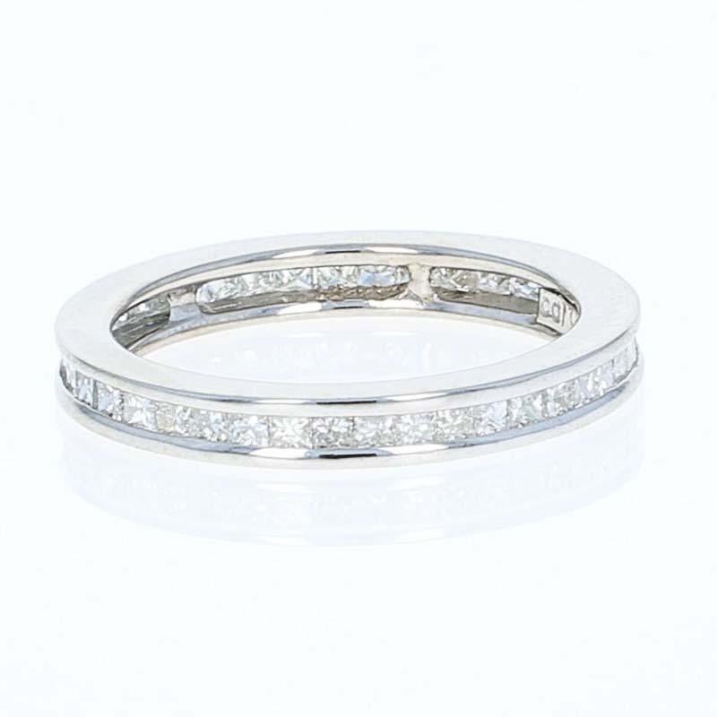 Whether it is worn solo or paired with your engagement ring, this radiantly beautiful wedding band will be an exquisite way to symbolize your everlasting love and commitment to one another. This 14k white gold band is fashioned in a meaningful