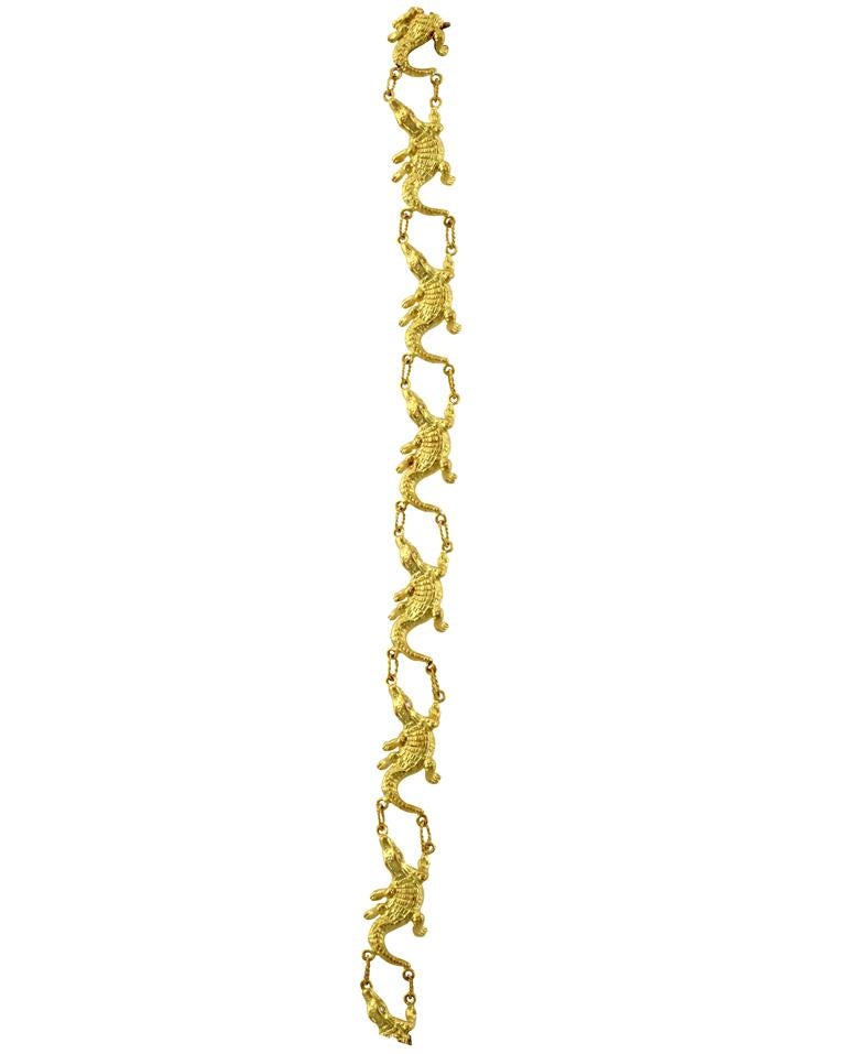 18k. Diamonds. These 18k. Gold miniature Alligators were separately Lost - Wax - Cast, polished and set with 14 White Diamond eyes and then assembled with 18k hand made links into this One-in-the-World bracelet. A glory of Symmetry and Movement. Box