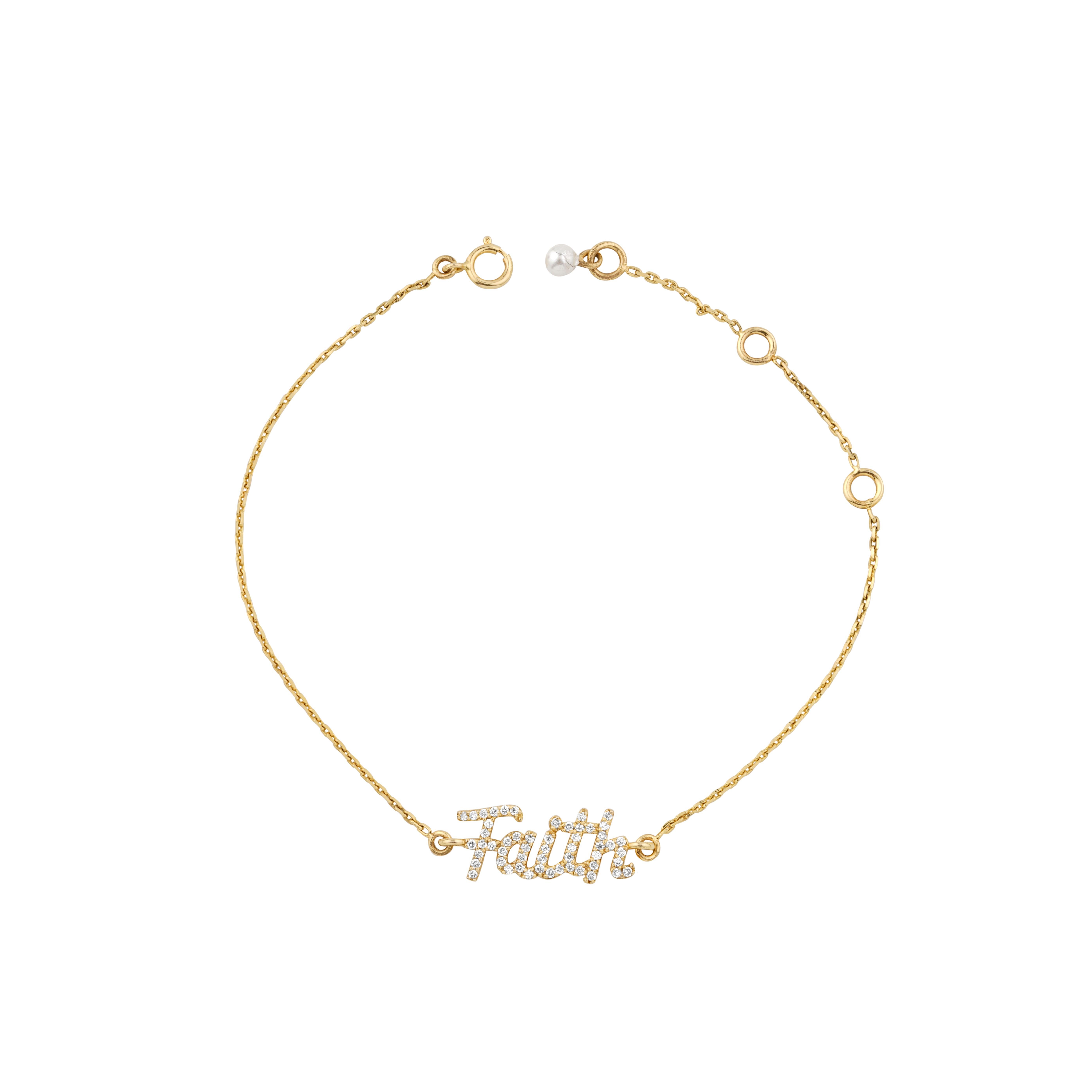 Diamond Faith Charm Bracelet features a dainty bracelet with the word 