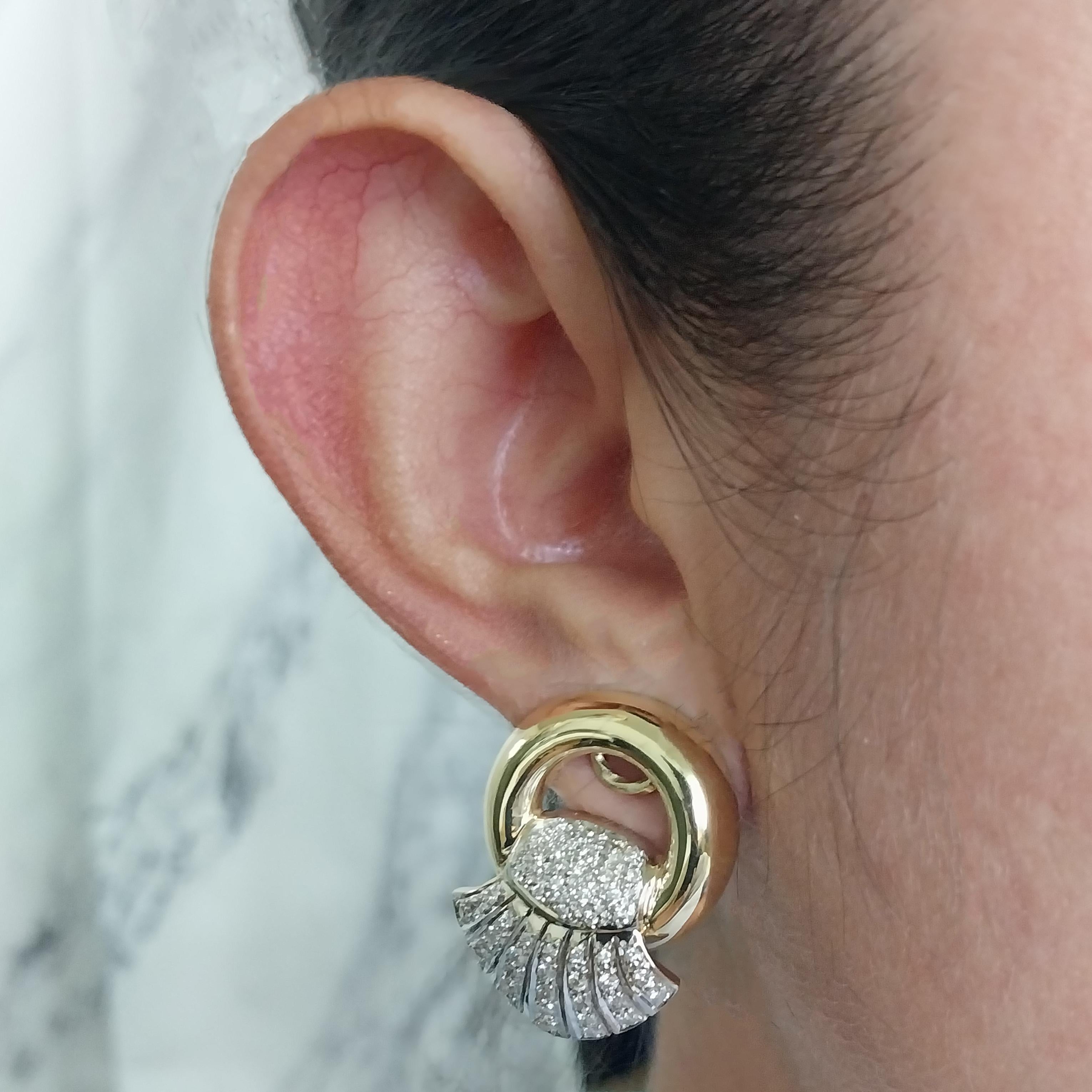 18 Karat Yellow Gold Fan Earrings Featuring 92 Round Brilliant Cut Diamonds of VS Clarity and H Color Totaling Approximately 1.00 Carat. Unpierced Design with Clip Back. Finished Weight is 23.3 Grams.

Matching bracelet available in separate listing.