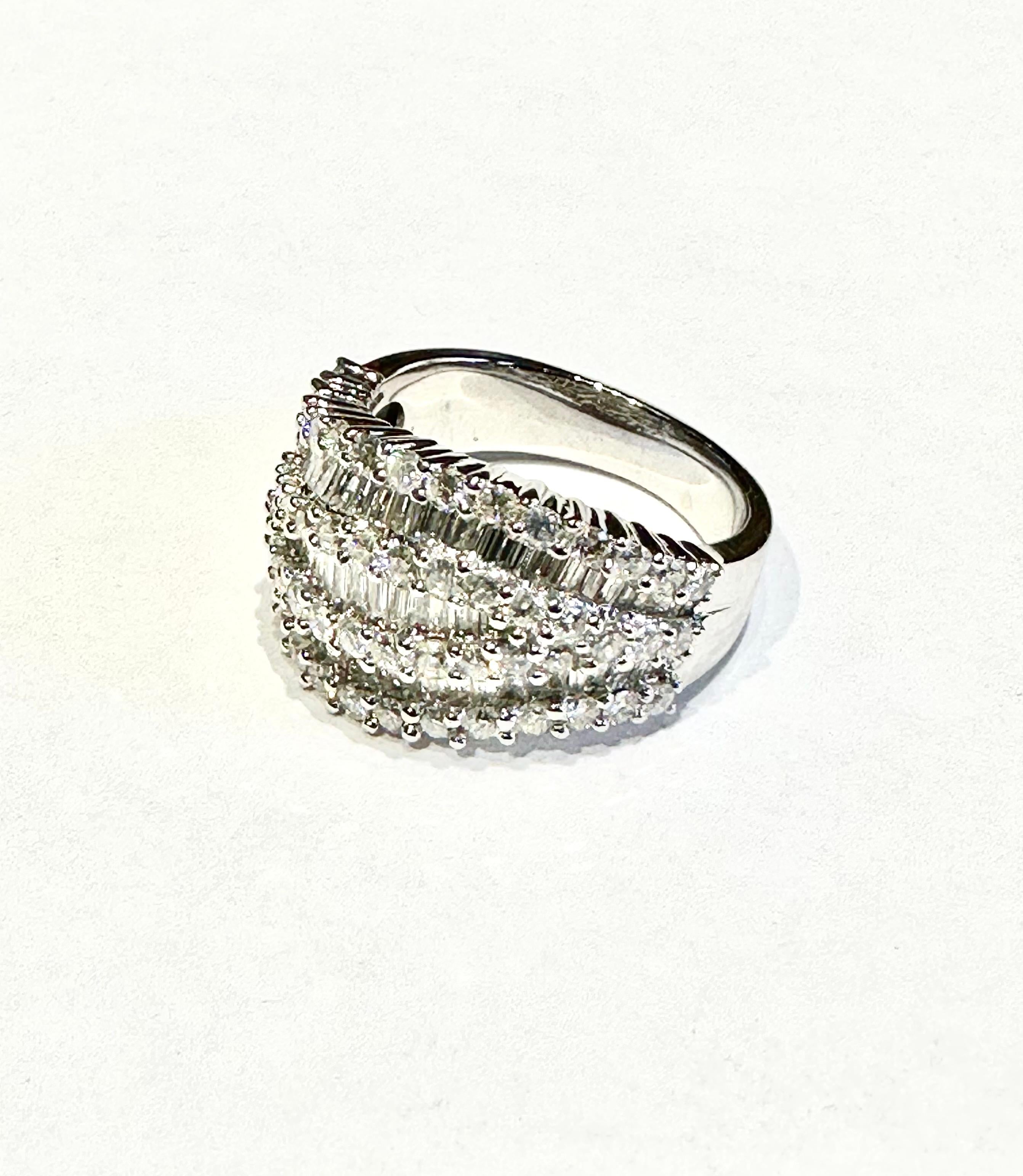 Ladies 18k 2.40 CT T.W.  Diamond Fashion Ring  Baguette and Round Diamonds

Description / Condition: New. All jewelry has been professionally scrutinized and cleaned prior to being offered for sale. 

Manufacturer: Custom made by A Step Back in