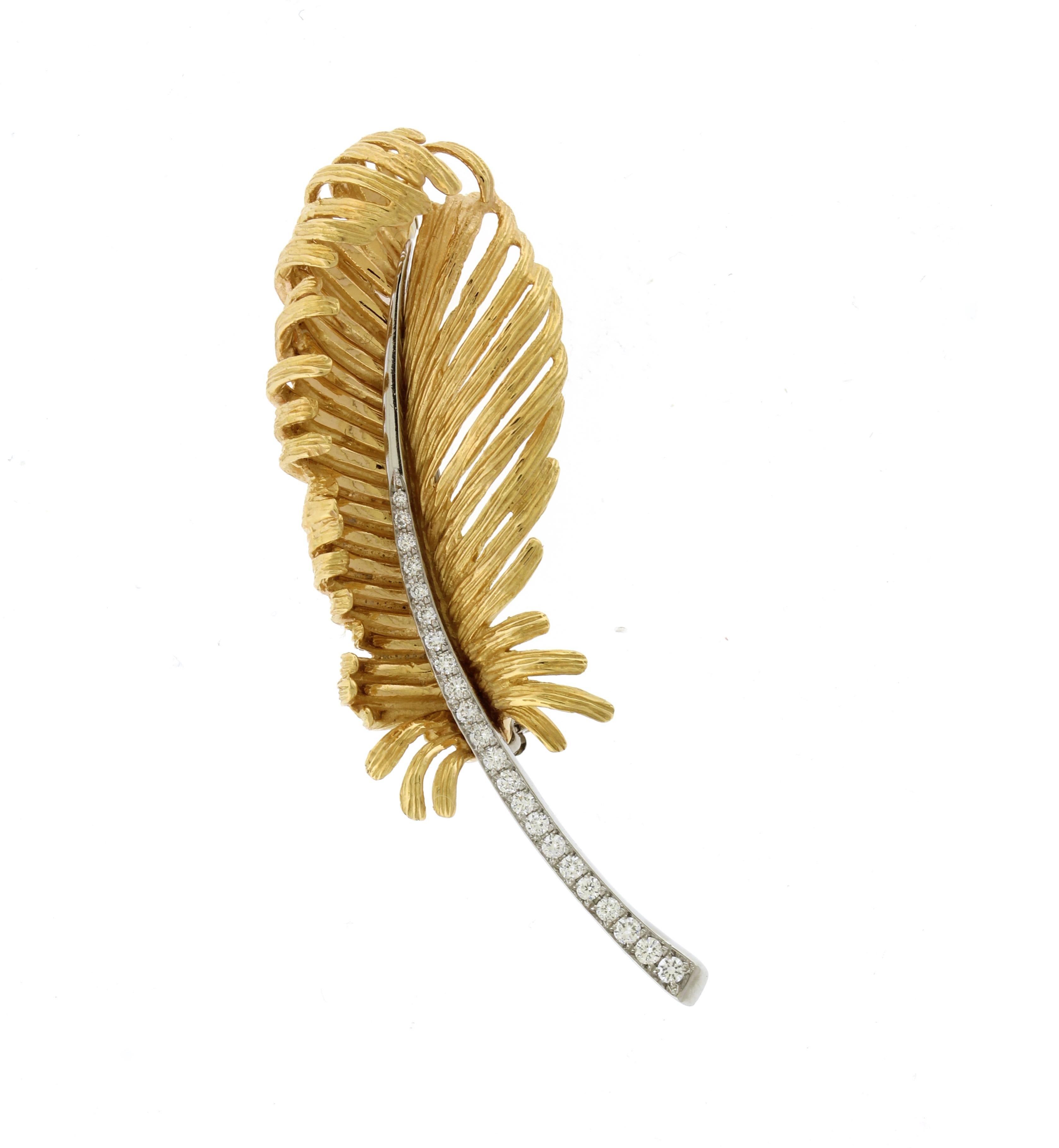 This textured feather is rose gold with diamonds set in platinum.  
• Metal: 18kt Rose Gold and Platinum
• Designer: Pampillonia Jewelers
• Gemstone: Diamonds
• Length: 2 1/8
• Weight: 10.8 grams
• Diamonds: 22 = .24carats
• Packaging: Pampillonia