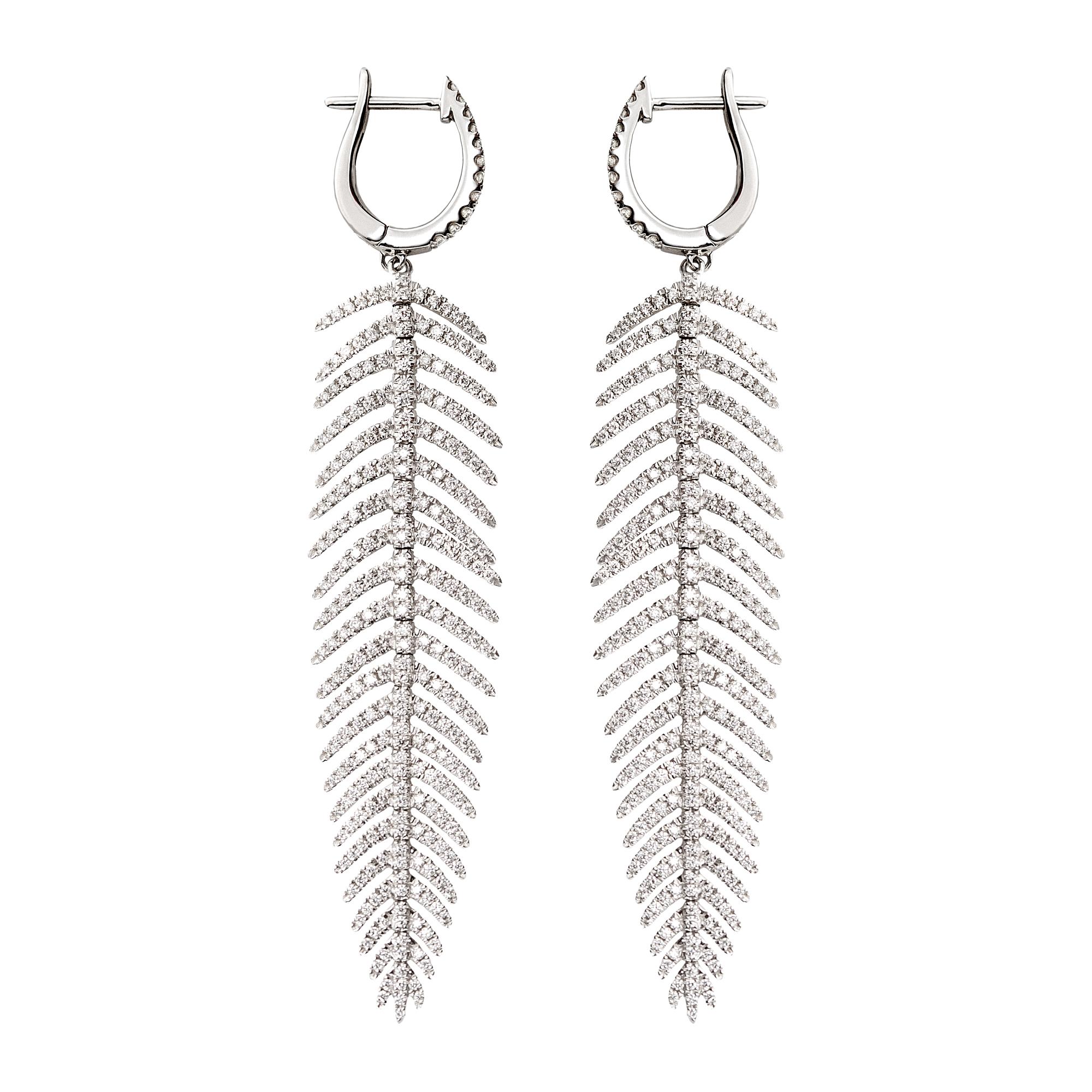 These exotic diamond encrusted feathers move with you. The full-cut diamonds reflect the light with a shimmer. 

Of articulated feather design 
3 inches in length
5/8 inches at widest 
570 full-cut diamonds
Approximate diamond total carat weight is
