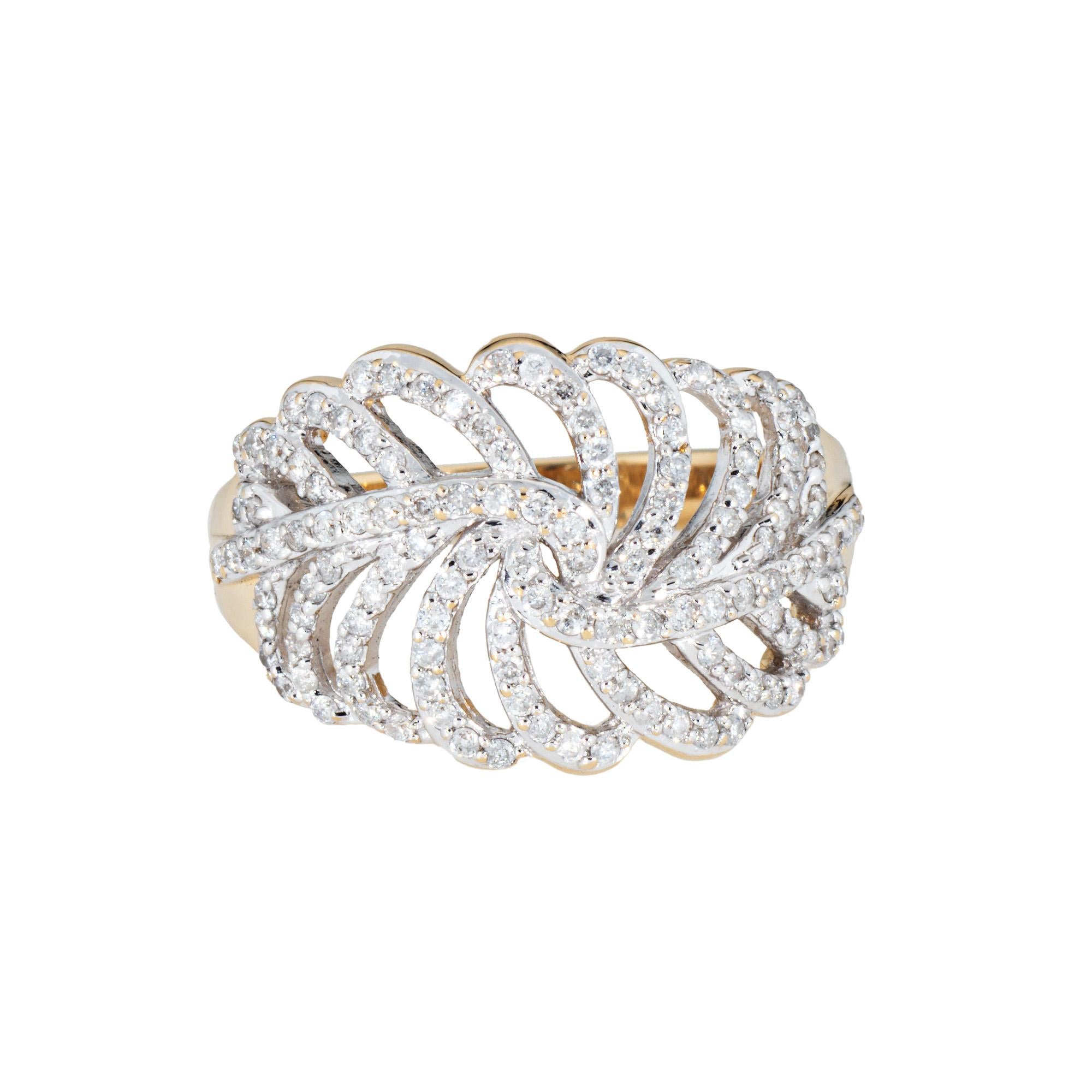 Stylish diamond feather ring crafted in 14 karat yellow & white gold. 

126 round brilliant cut diamonds total an estimated 0.60 carats (estimated at I-J color and SI2-I2 clarity). 

The openwork feather design makes a lovely statement on the hand!