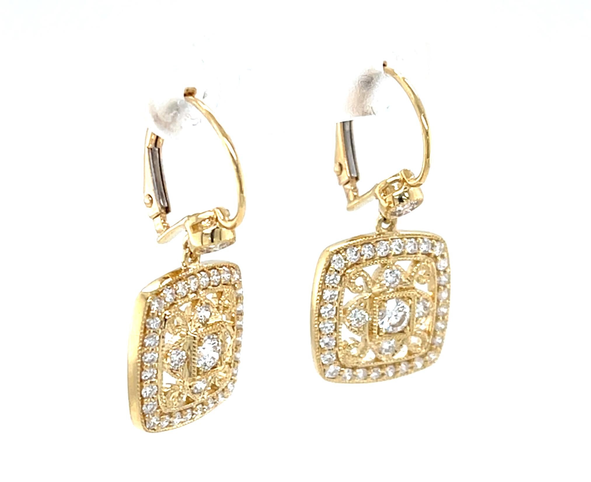 Diese filigranen Ohrringe sind mit 68 runden Diamanten im Brillantschliff besetzt, die zusammen fast ein Karat ergeben. Wunderschön gefertigt aus 18 Karat Gelbgold. Sie haben ein angenehmes Gewicht und einen mühelosen Stil und werden sicher Ihre