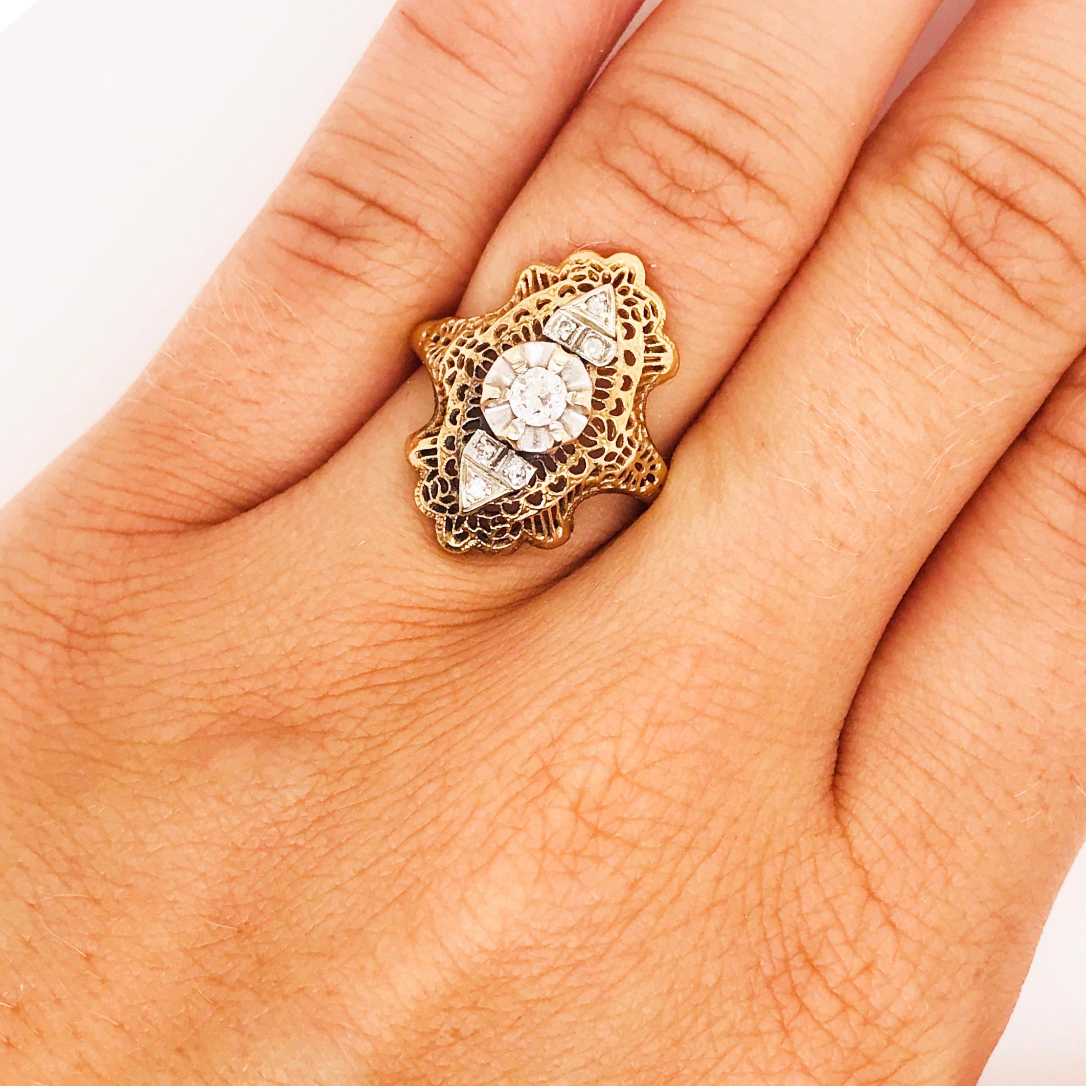 The 1930's were romantic, classy and decorative. The 1920-30 time period is well known for its fashion trends and Art Deco design. This ring embodies the true Art Deco 1930's perfectly. This filigree, diamond dinner ring has an open filigree design