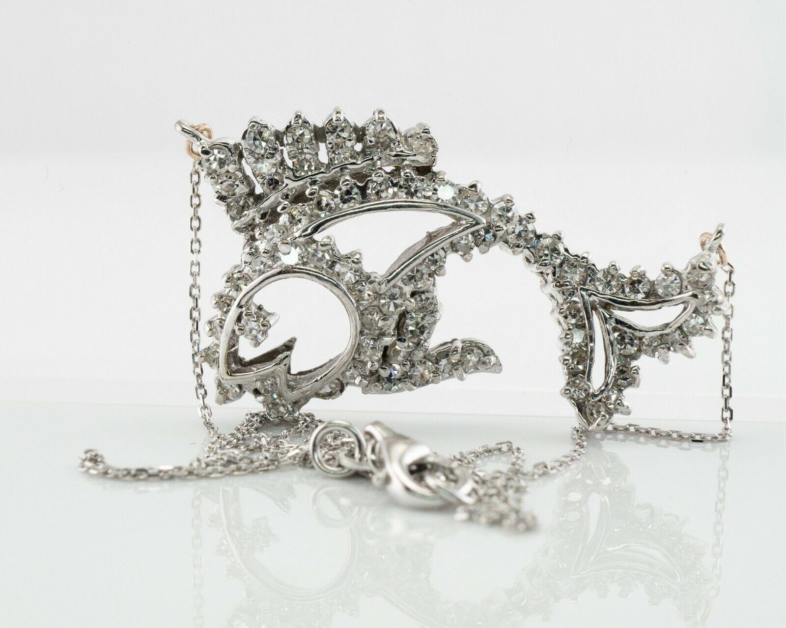 Diamond Fish Pendant Necklace 14K White Gold 2.04 TDW

This one of a kind estate necklace is finely crafted in solid 14K White Gold. 
The fish in the center is studded with 68 natural single cut fiery diamonds. 
The grand total diamond weight for