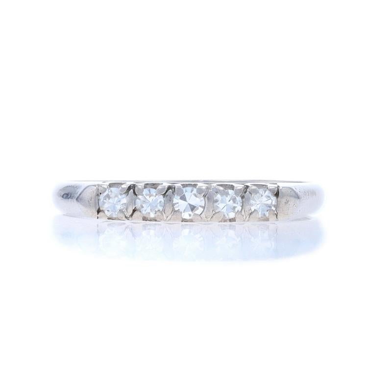 Size: 6 1/2
Sizing Fee: Up 2 sizes for $50 or Down 1 size for $40

Metal Content: Platinum 950

Stone Information

Natural Diamonds
Carat(s): .15ctw
Cut: Single
Color: G - H
Clarity: VS1 - VS2

Total Carats: .15ctw

Style: Five-Stone, Wedding Band