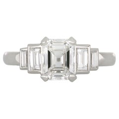 Diamond flanked solitaire ring, circa 1930.