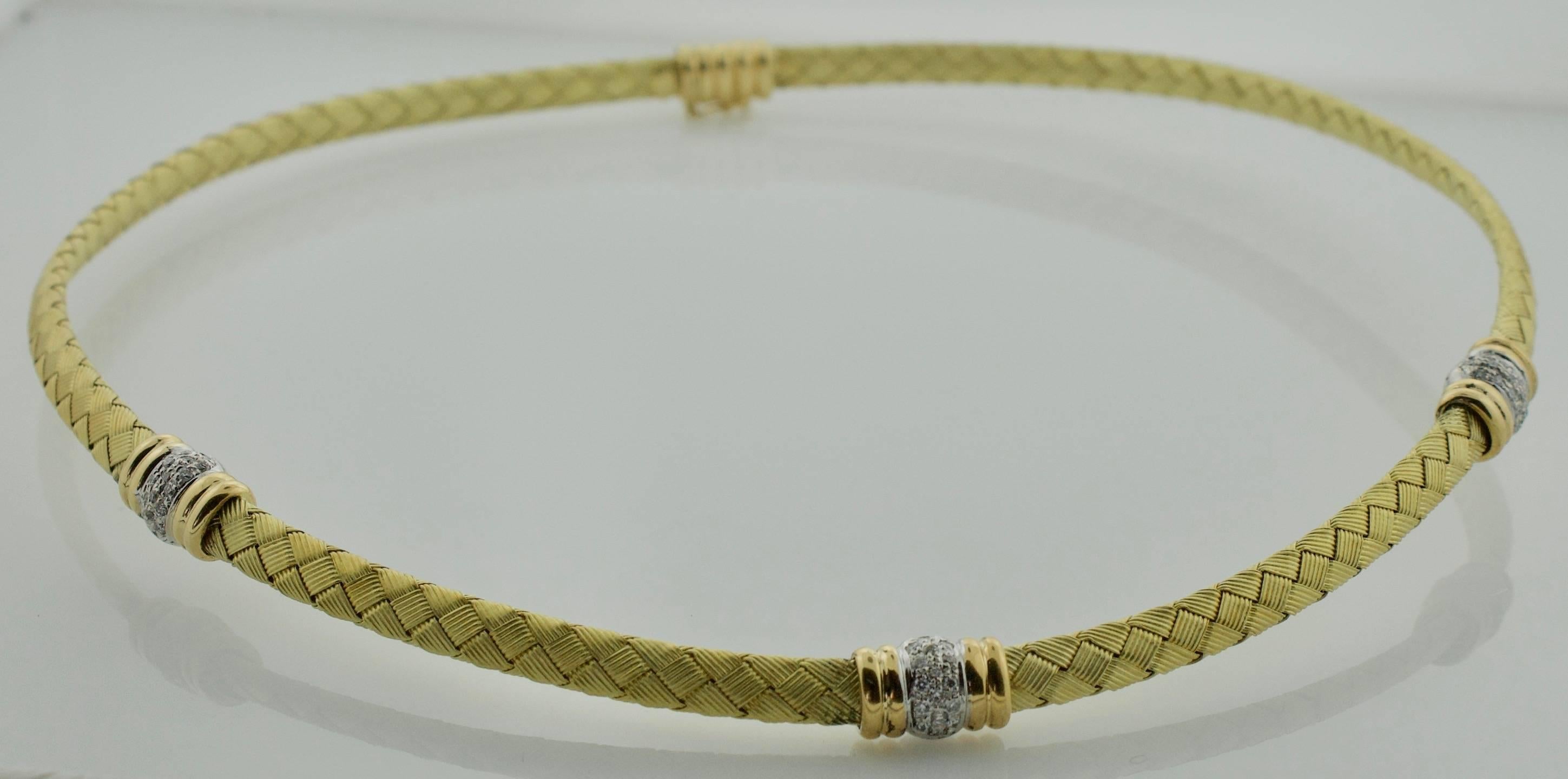 Diamond Collar in 18k Yellow Gold
Woven an flexible
Forty Eight Round Brilliant Cut Diamonds weighing .50 carats approximately [GH VVS-VS]
Very Fine Quality. In Perfect Condition


