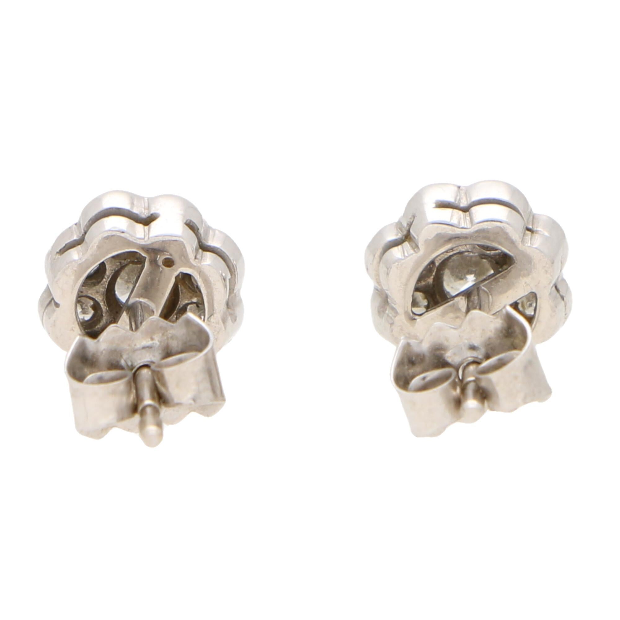 Round Cut Diamond Floral Cluster Stud Earrings Set in 18 Karat White Gold