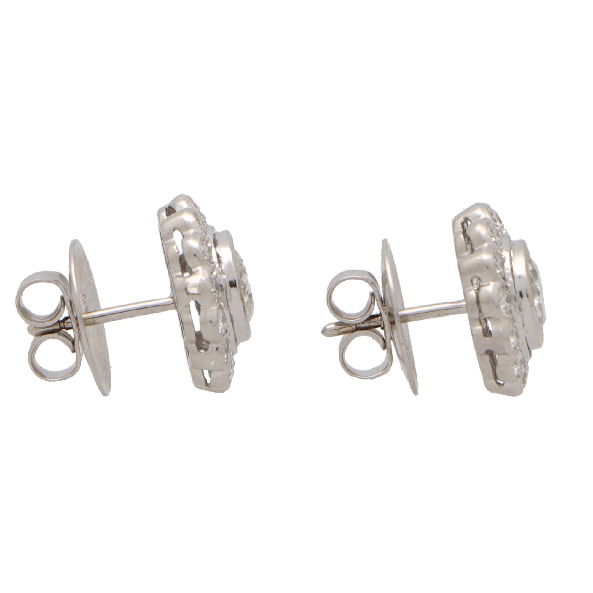 Modern Diamond Floral Cluster Stud Earrings Set in Platinum For Sale