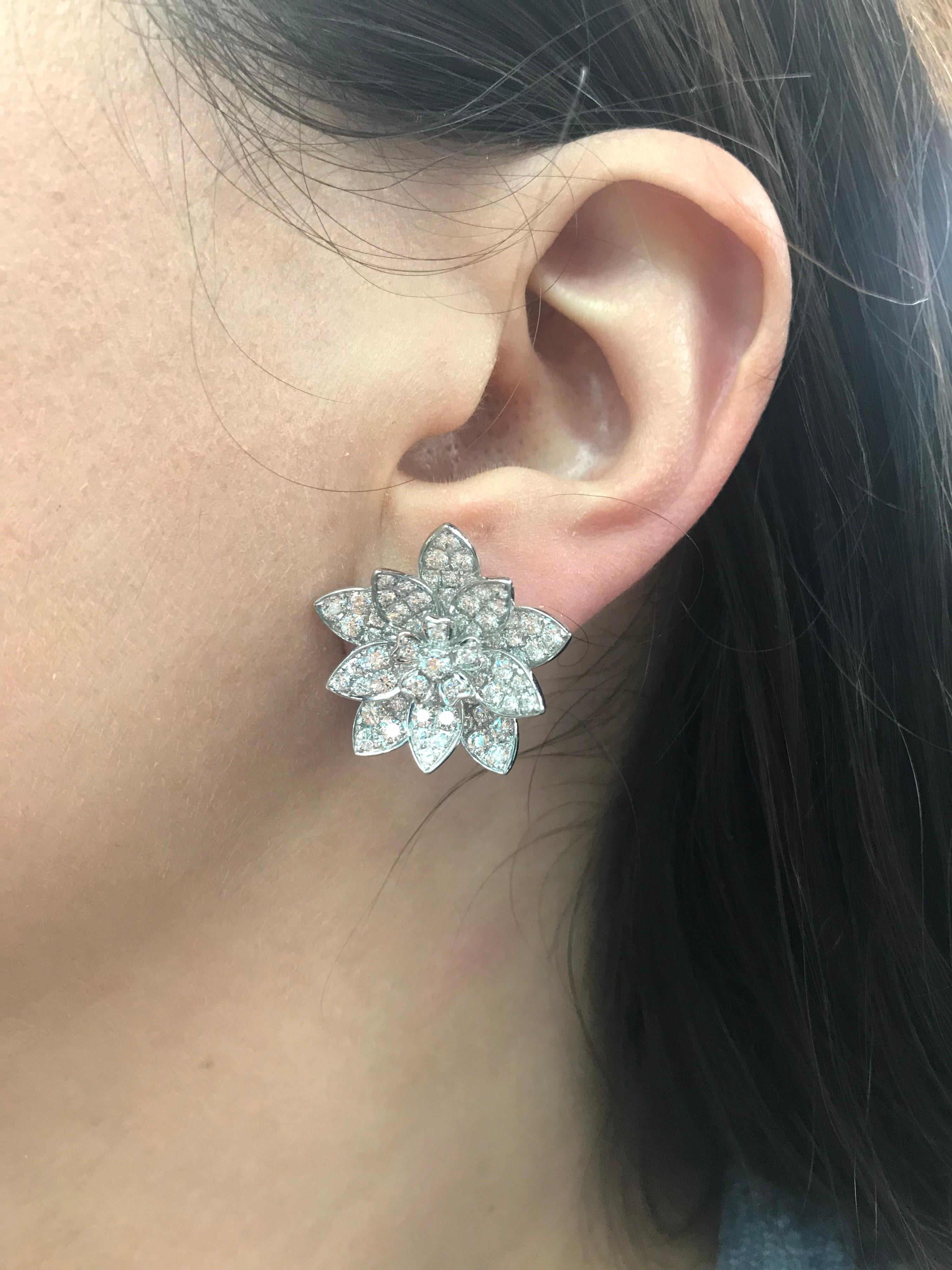 18K White gold floral earrings featuring 152 round brilliants weighing 3.87 carats. Beautiful craftsmanship! 
Color G
Clarity VS-SI