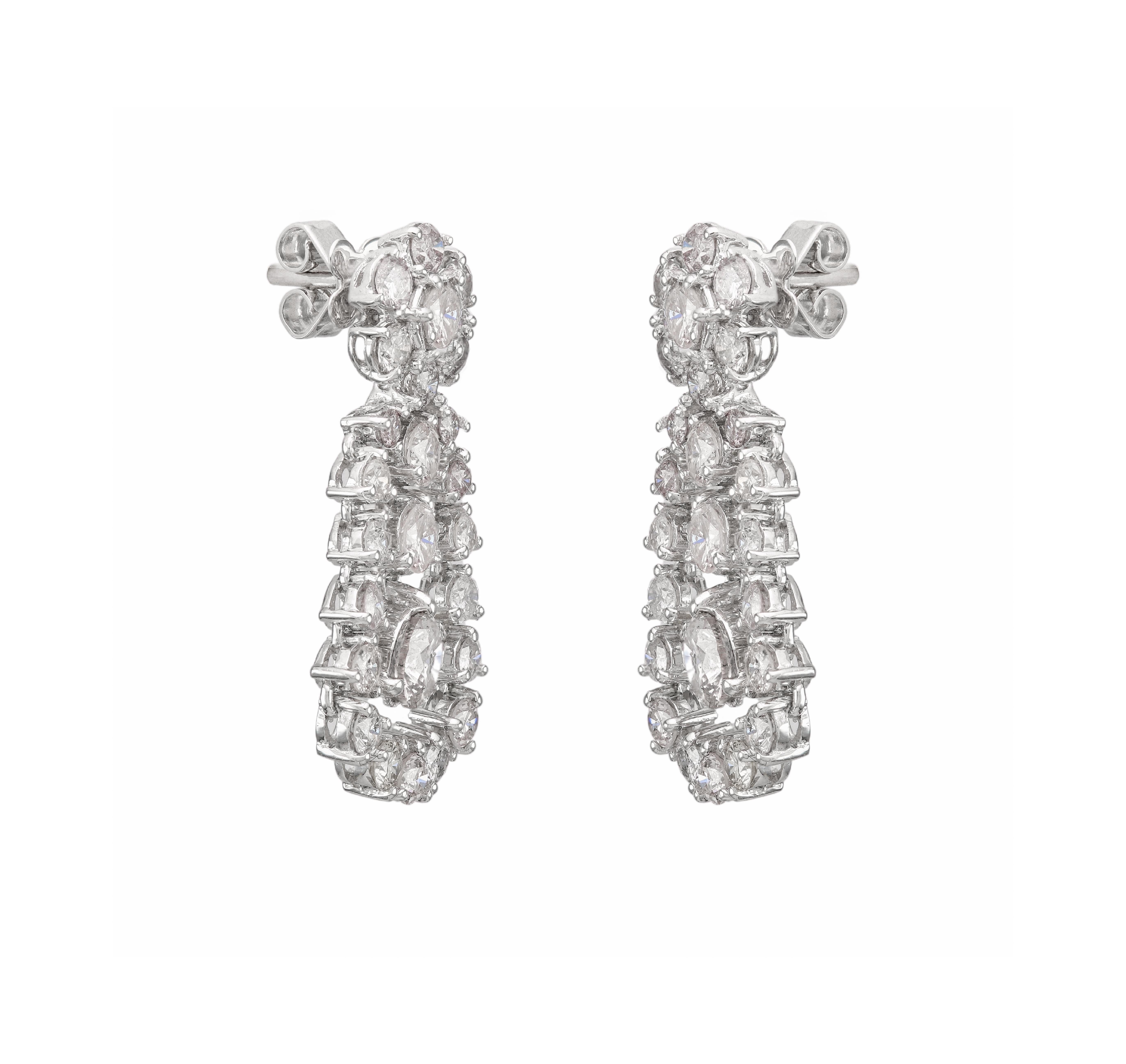 Diamond Floral Cluster Drop Earrings 4.40 Carat Diamonds

Magnificent Edwardian Style, pair of victorian style diamond floral cluster drop earrings, featuring a total of 4.40 carat diamonds. This beautiful earring has frequently larger stones, there