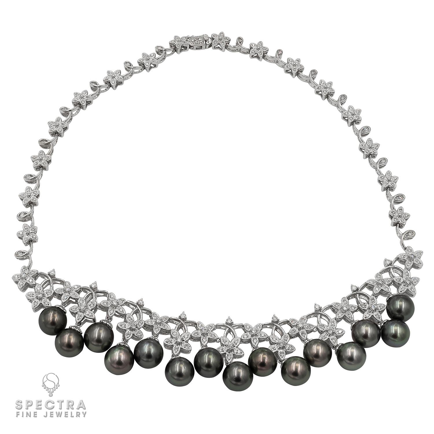 Indulge in the enchanting allure of this Diamond Floral Garland and Tahitian Pearl Necklace — a masterpiece meticulously crafted in 18K white gold. This lovely necklace features Tahitian pearls, ranging from approximately 9.60 mm to 9.10 mm,