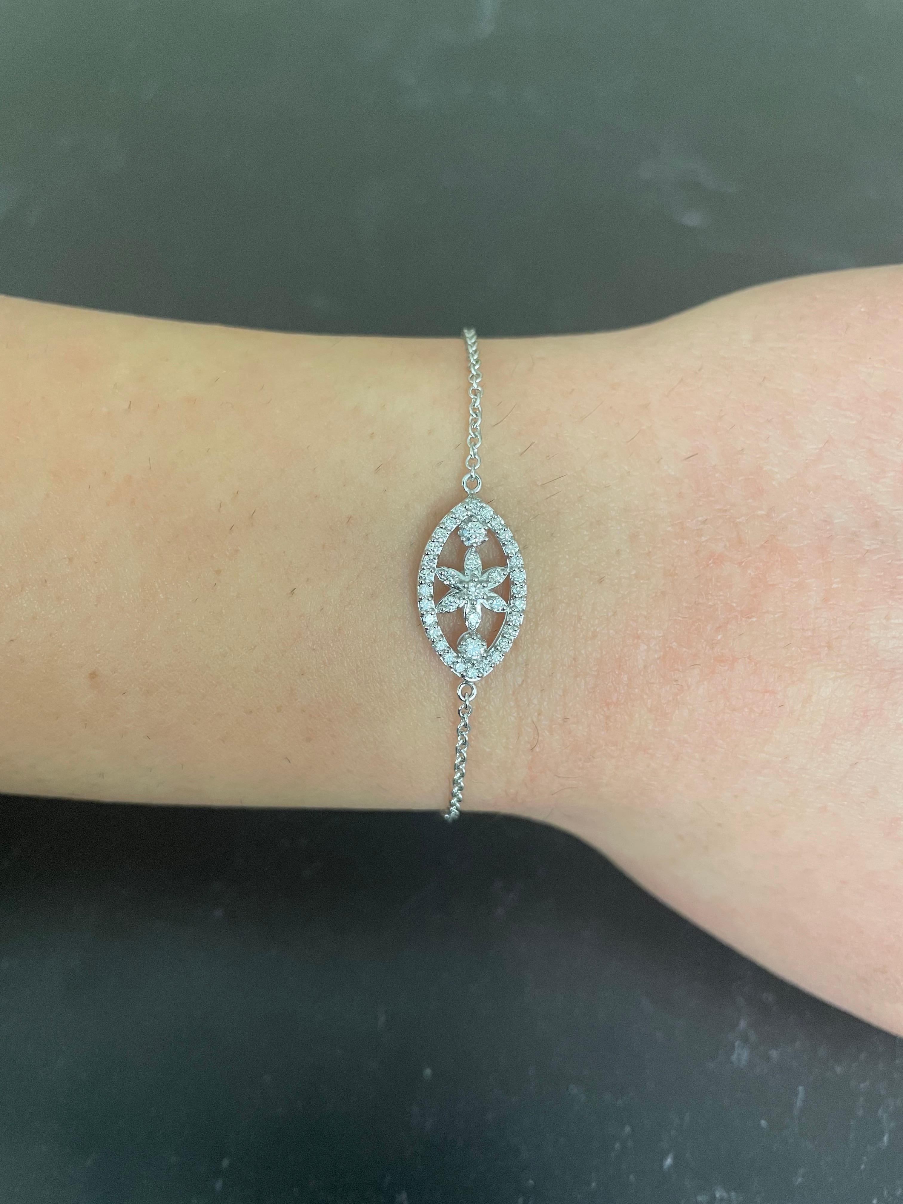 Stones: 37 Round Brilliant White Diamonds at 0.40 Carats Total Weight 
Clarity: SI / Color: H-I
Metal: 14K White Gold
Lobster Clasp with Adjustable Bolo for an adjustable fit

Fine one-of-a-kind craftsmanship meets incredible quality in this