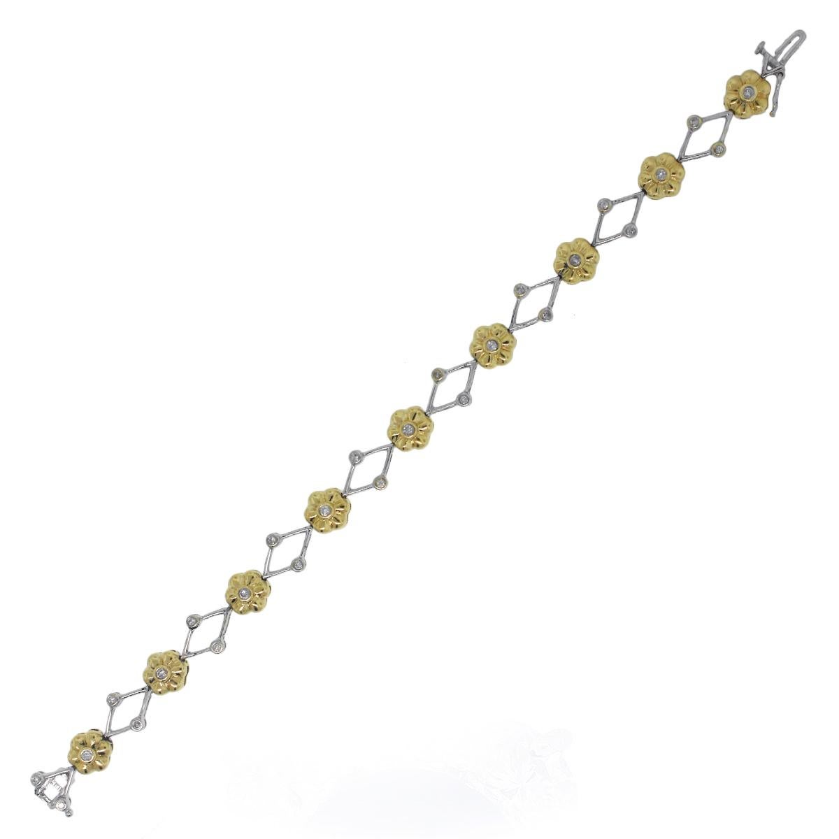 Material: 14k Yellow Gold and 14k White Gold
Diamond Details: Approximately 0.45ctw round brilliant diamonds. Diamonds are J in color and SI2 in clarity.
Clasp: Tongue in box clasp with safety latch
Total Weight: 12.2g (7.8dwt)
Length: 7