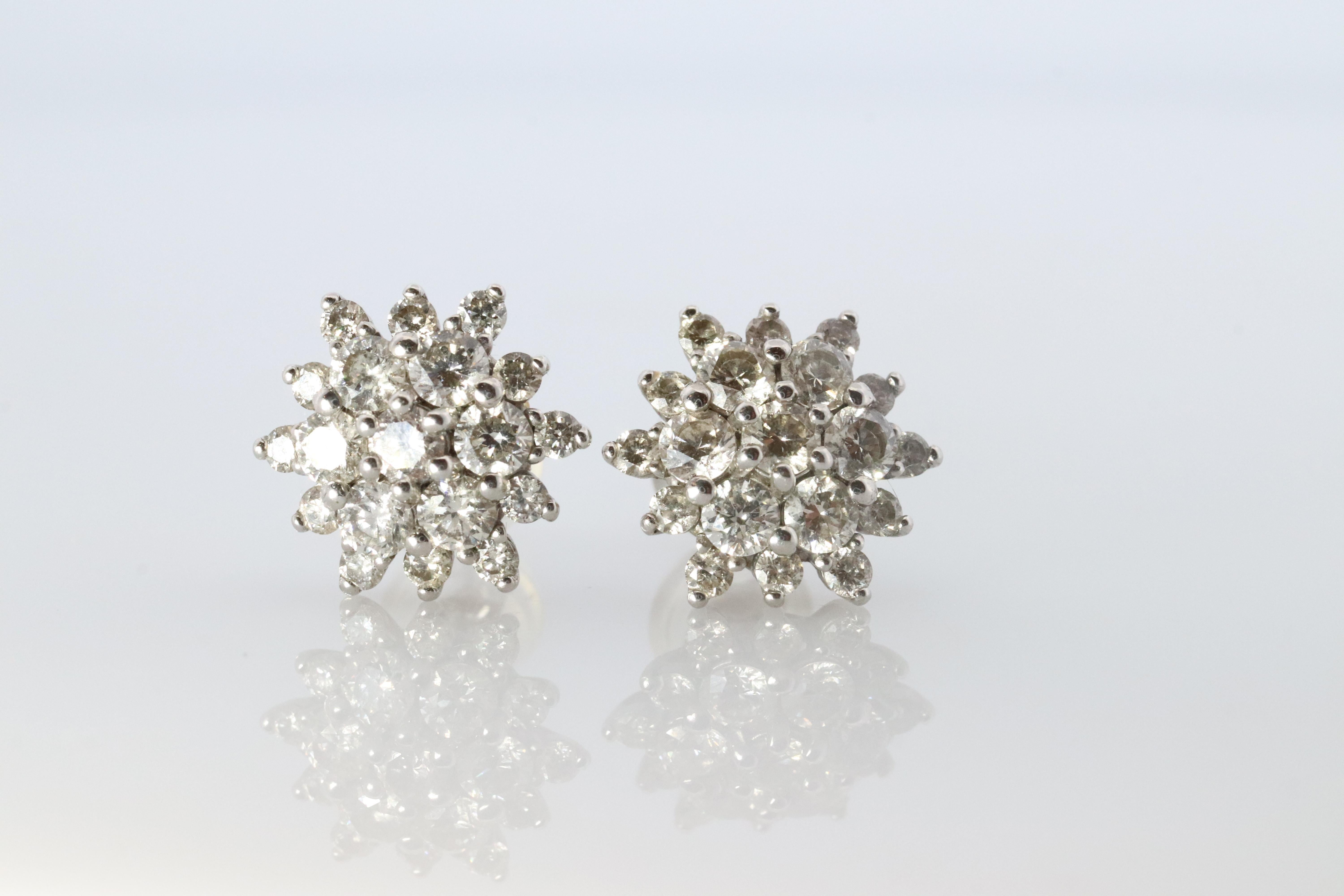 Diamond Flower Cluster Stud Earrings.  Platinum Earrings. Pt900 and 1CTW dia. In Good Condition For Sale In Port Charlotte, FL