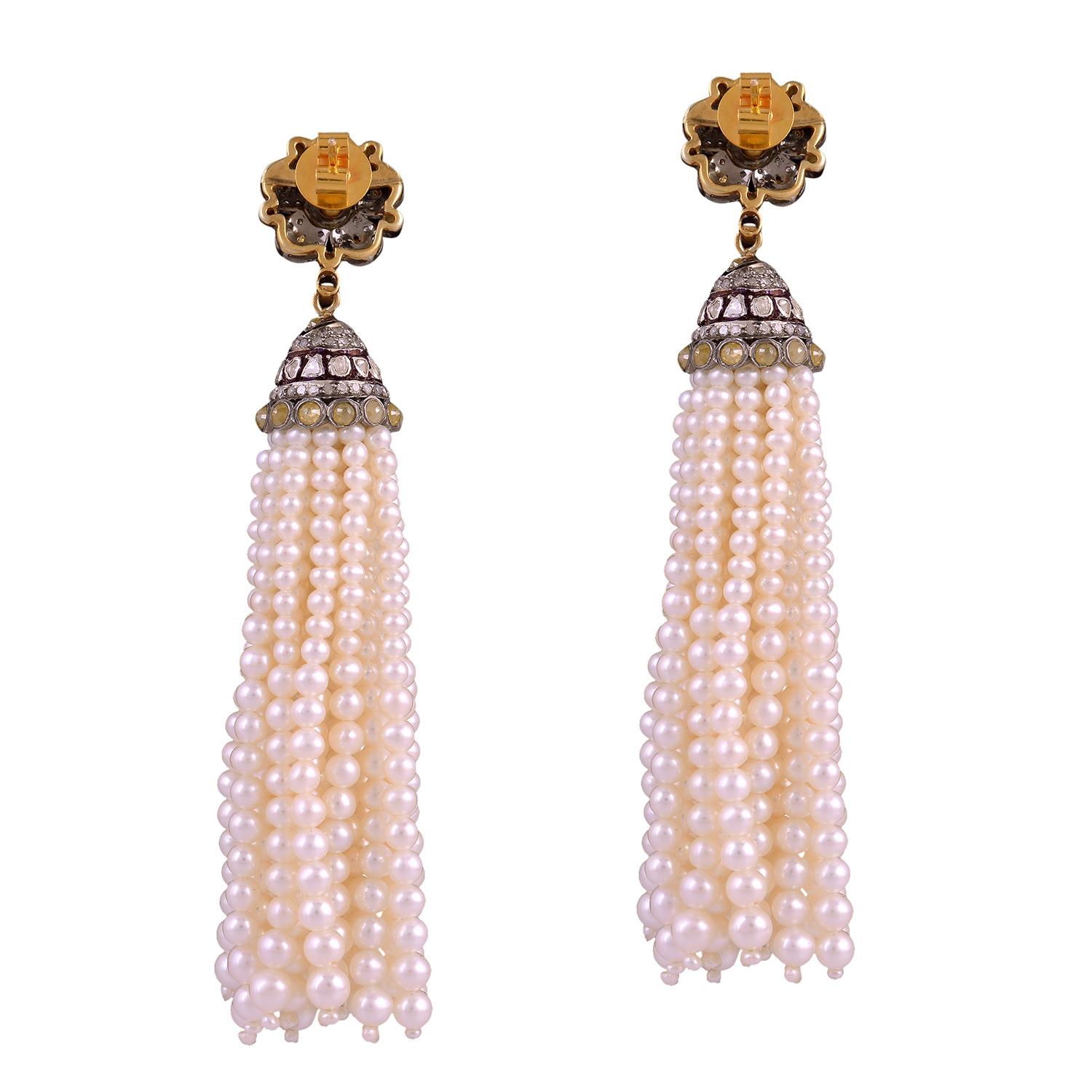 Beautiful this diamond flower motif pearl tassel earrings are simply lovely and an evergreen earring. 

Closure: Push post
18K: 2.076g
Diamond: 5.380ct
SI: 10.45g
Pearl: 232.00ct,