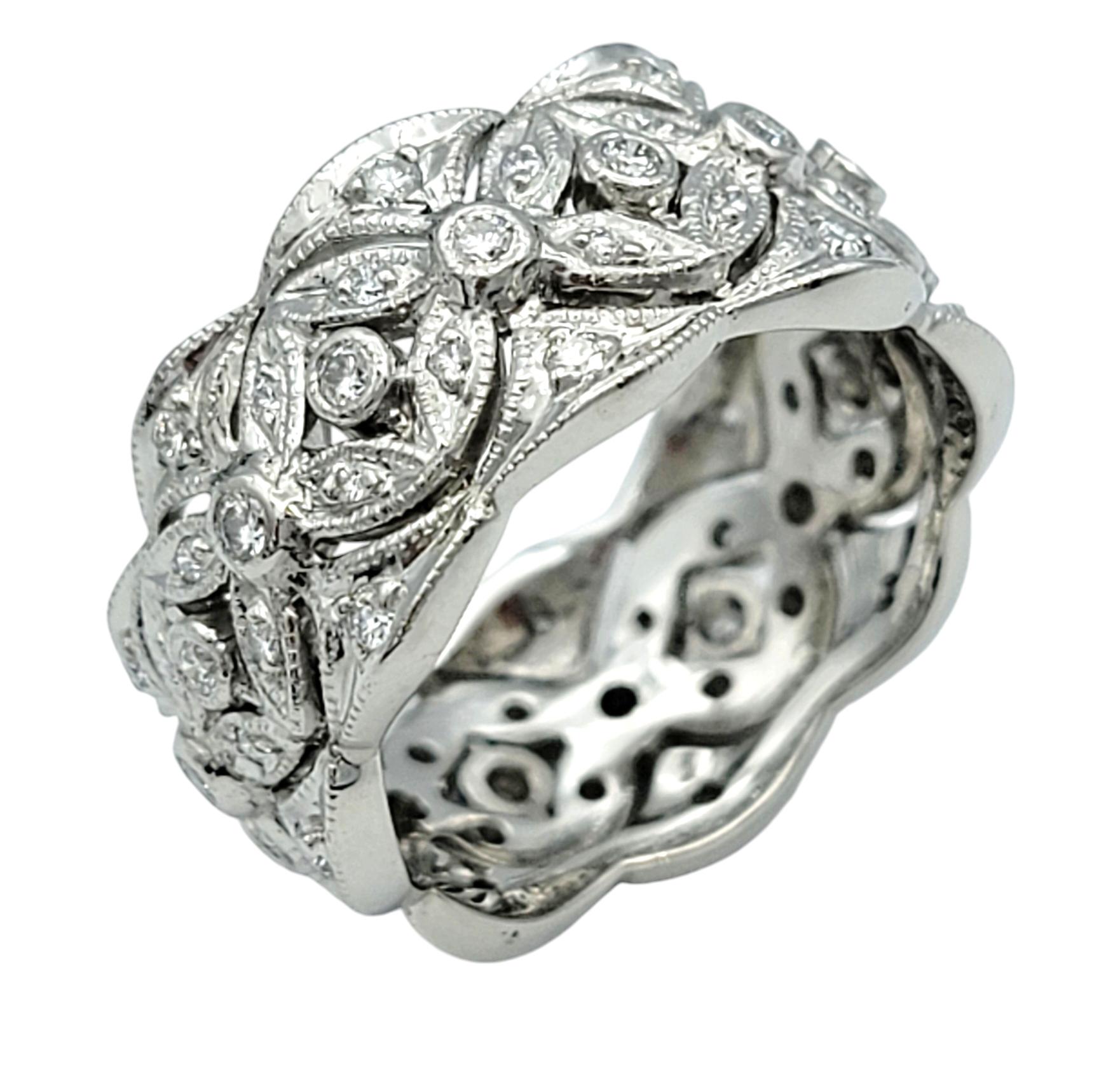 Ring Size: 6

Immerse yourself in the enchanting beauty of this platinum band ring, a piece that redefines elegance with its delicate flower design. Each intricate cutout blossom is carefully crafted, creating a continuous floral motif that wraps