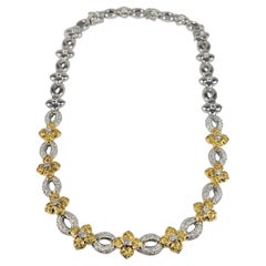 Collier de fleur en or 18 carats bicolore avec diamants