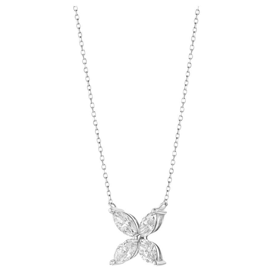 This delicate diamond flower pendant features four beautiful marquise diamonds precisely cut to hug the sparkling diamond center.  The 18k white gold chain provides two different length options 16 in / 18 in, making this necklace an effortlessly