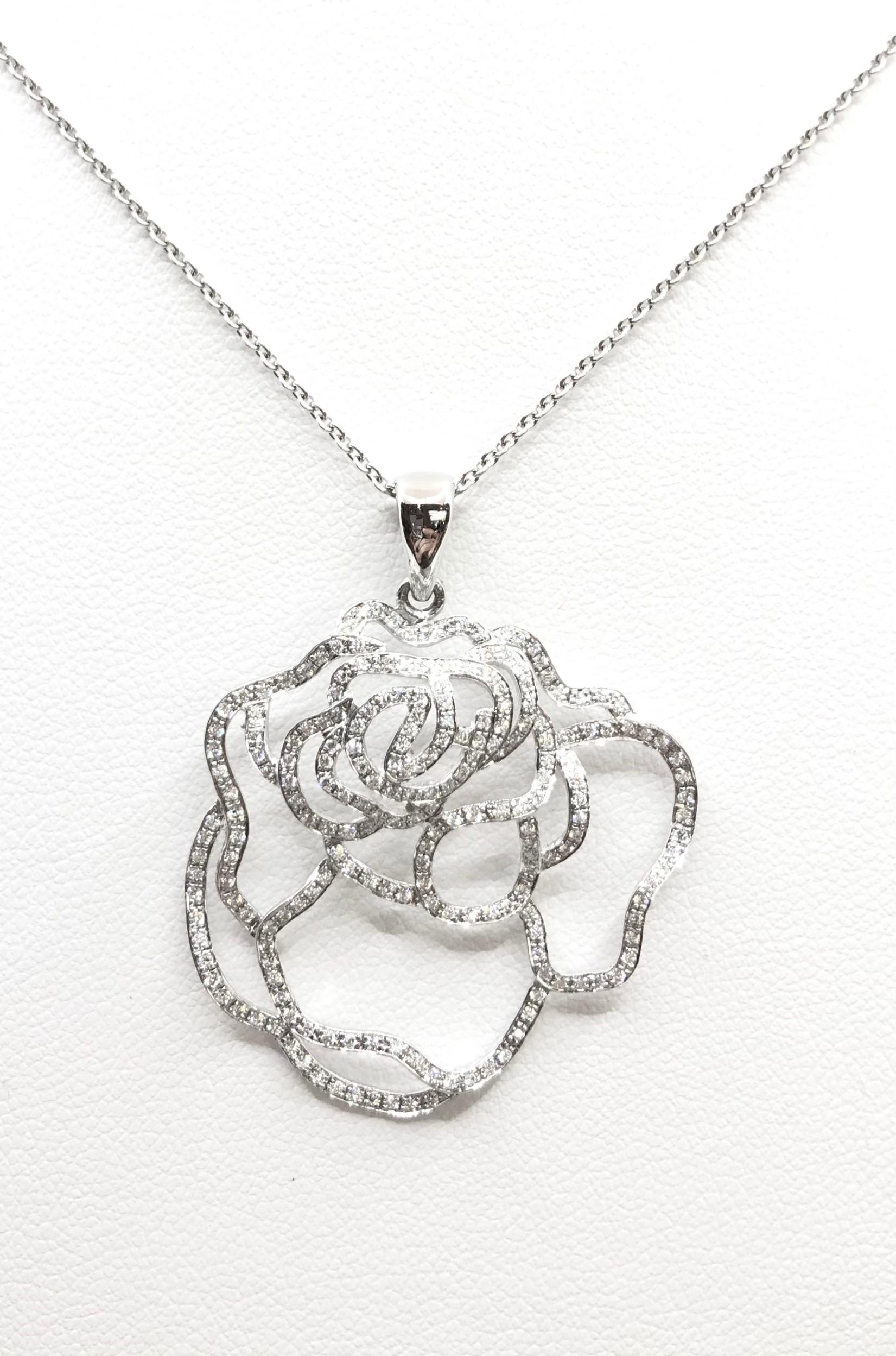 Diamond 0.56 carat Pendant set in 18 Karat White Gold Settings
(chain not included)

Width: 3.2 cm 
Length: 3.9 cm
Total Weight: 3.13 grams

