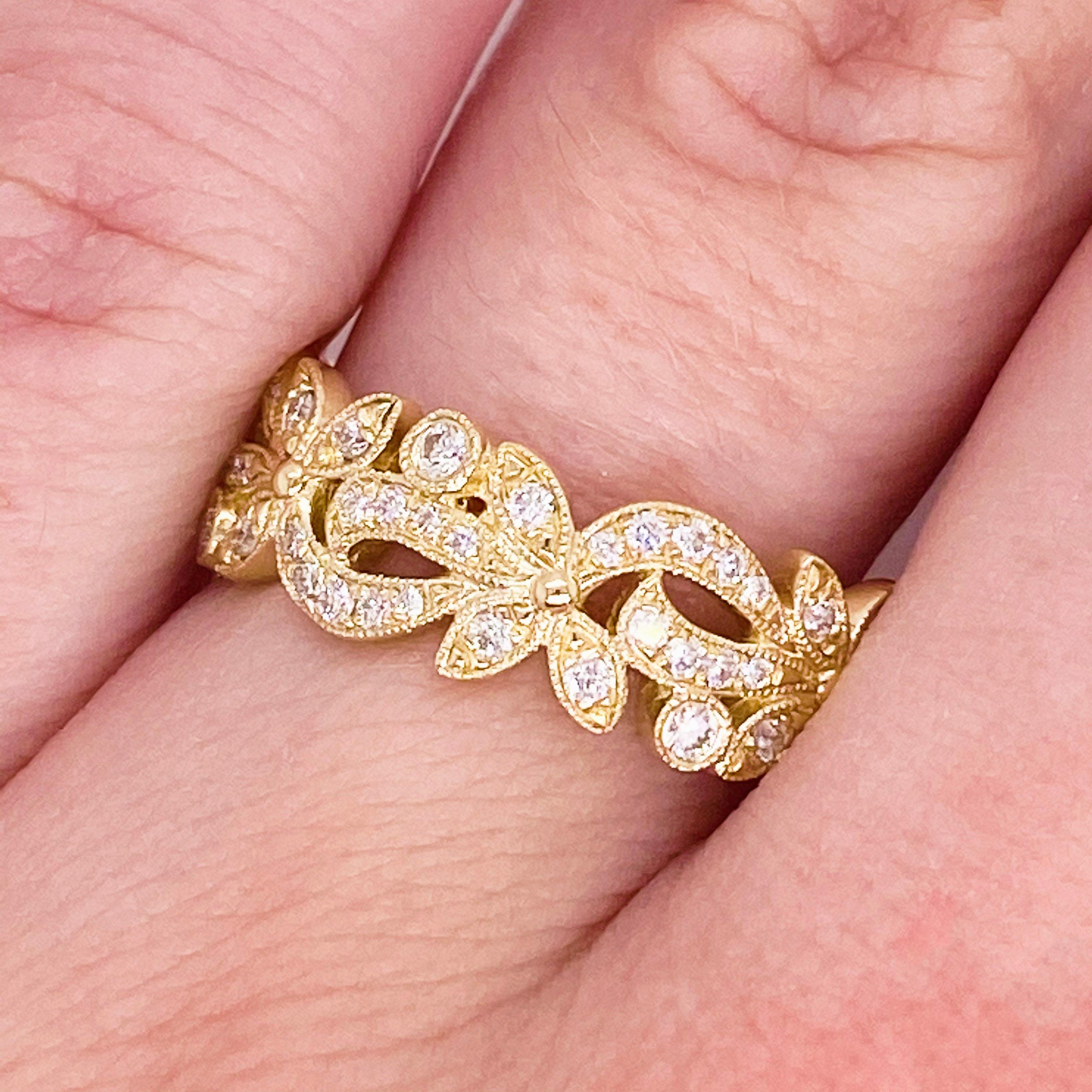 This lovely diamond band has gorgeous floral inspired detailing! Accented by lovely 14 karat yellow gold, this ring is an amazing fashion band and stackable band!  This pairs well with most engagement rings and wedding bands as well!  Treat yourself