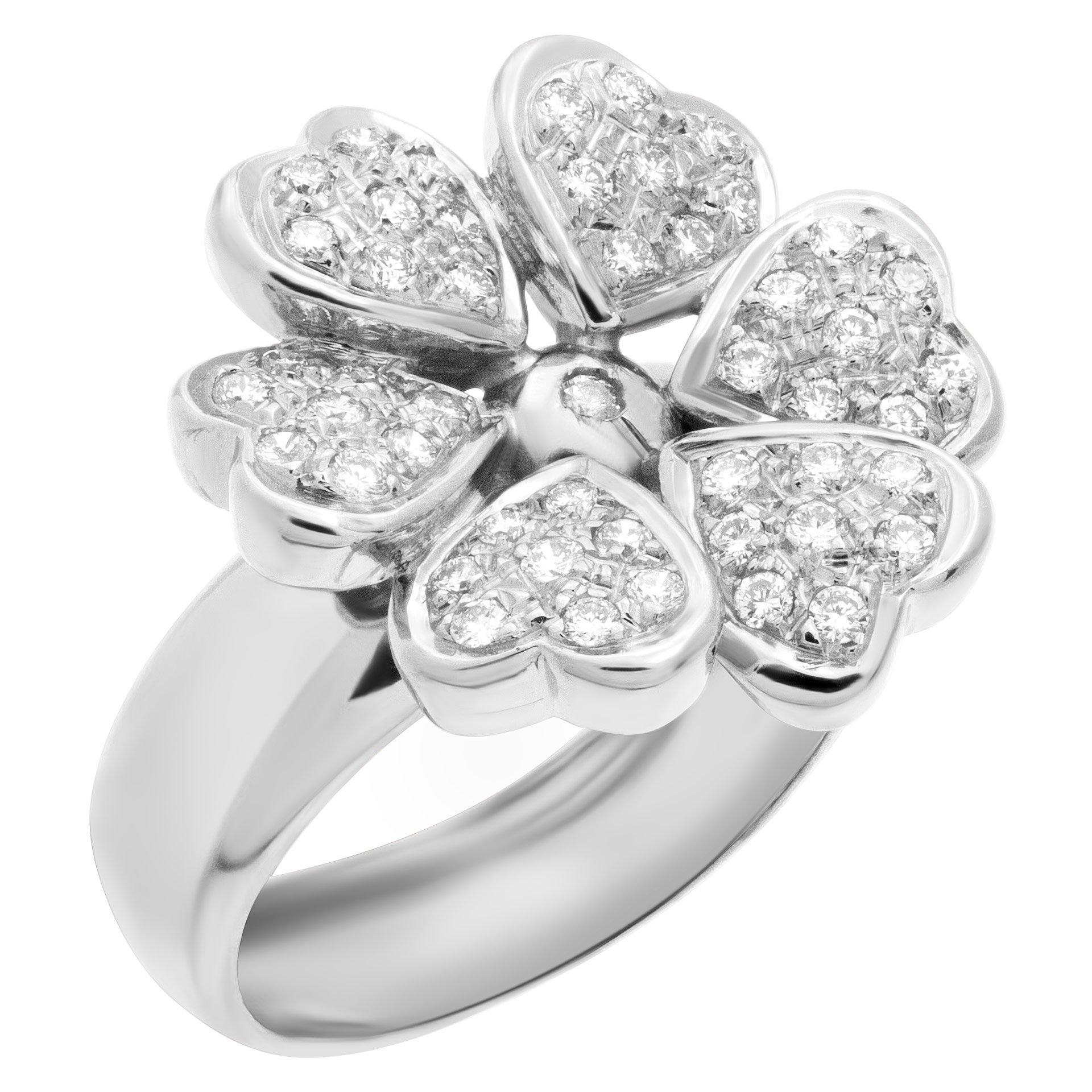 Diamond Flower ring with 0.60 carat in G-H color, VS clarity diamonds set in 18k white gold. Size 6.5

This Diamond ring is currently size 6.5 and some items can be sized up or down, please ask! It weighs 6.2 pennyweights and is 18k White Gold.
