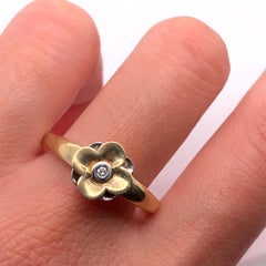 Diamond flower shaped cocktail dress ring yellow gold