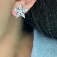 Diamond flower shaped stud earrings 18k white gold