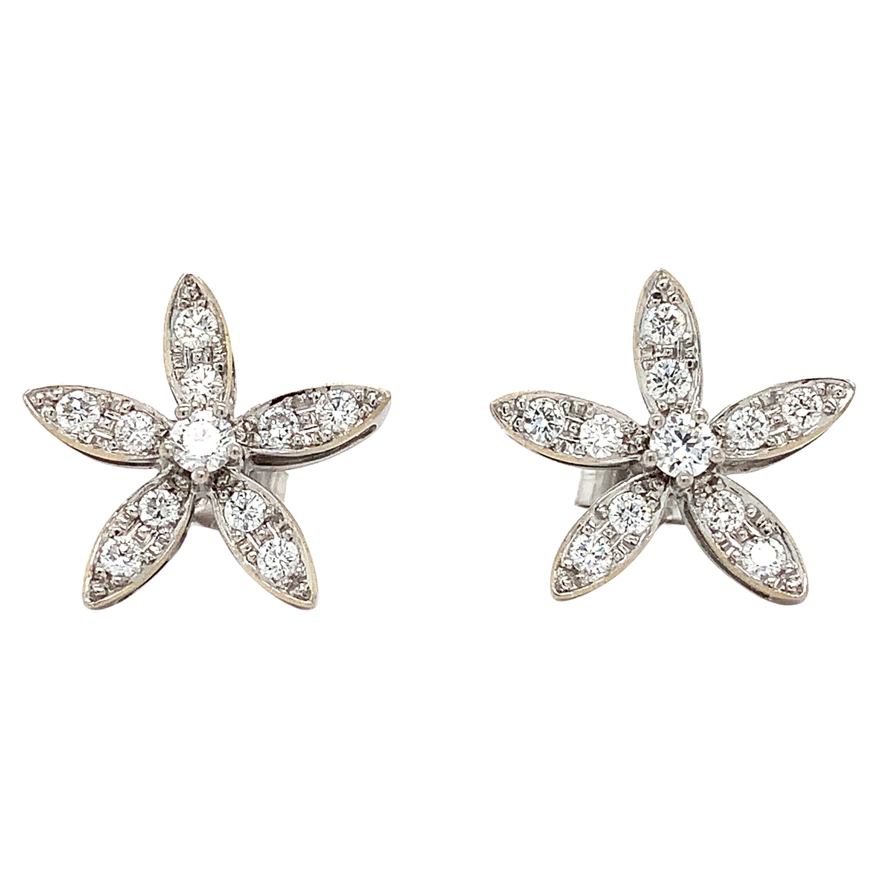 Diamond flower shaped stud earrings 18k white gold