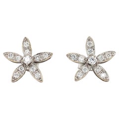 Diamond flower shaped stud earrings 18k white gold