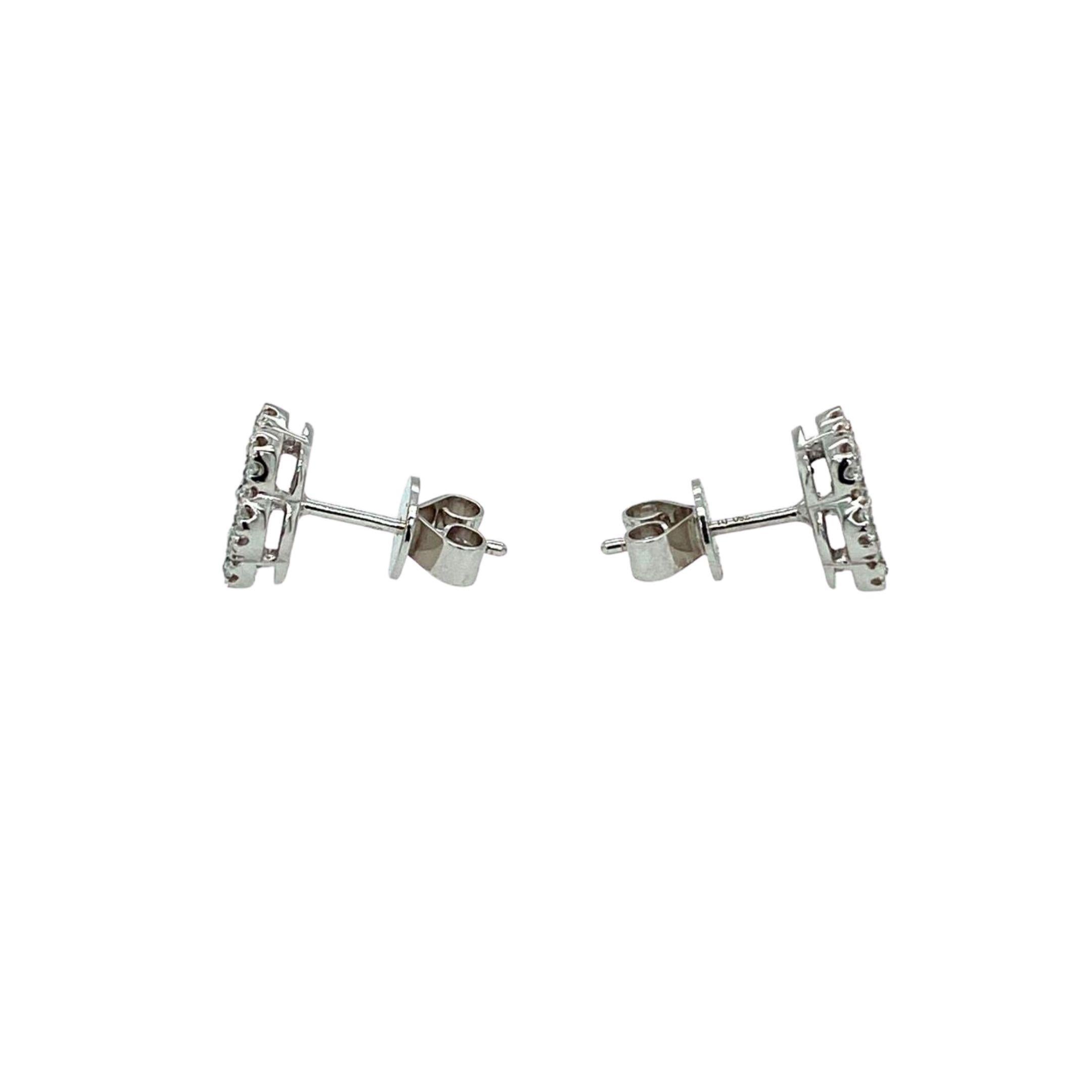 Diamond Flower Stud Earrings made with real/natural brilliant cut diamonds. Total Weight: 1.04 carats, Diamond Quantity: 62 (round diamonds). Set on 18 karat white gold, push back setting.